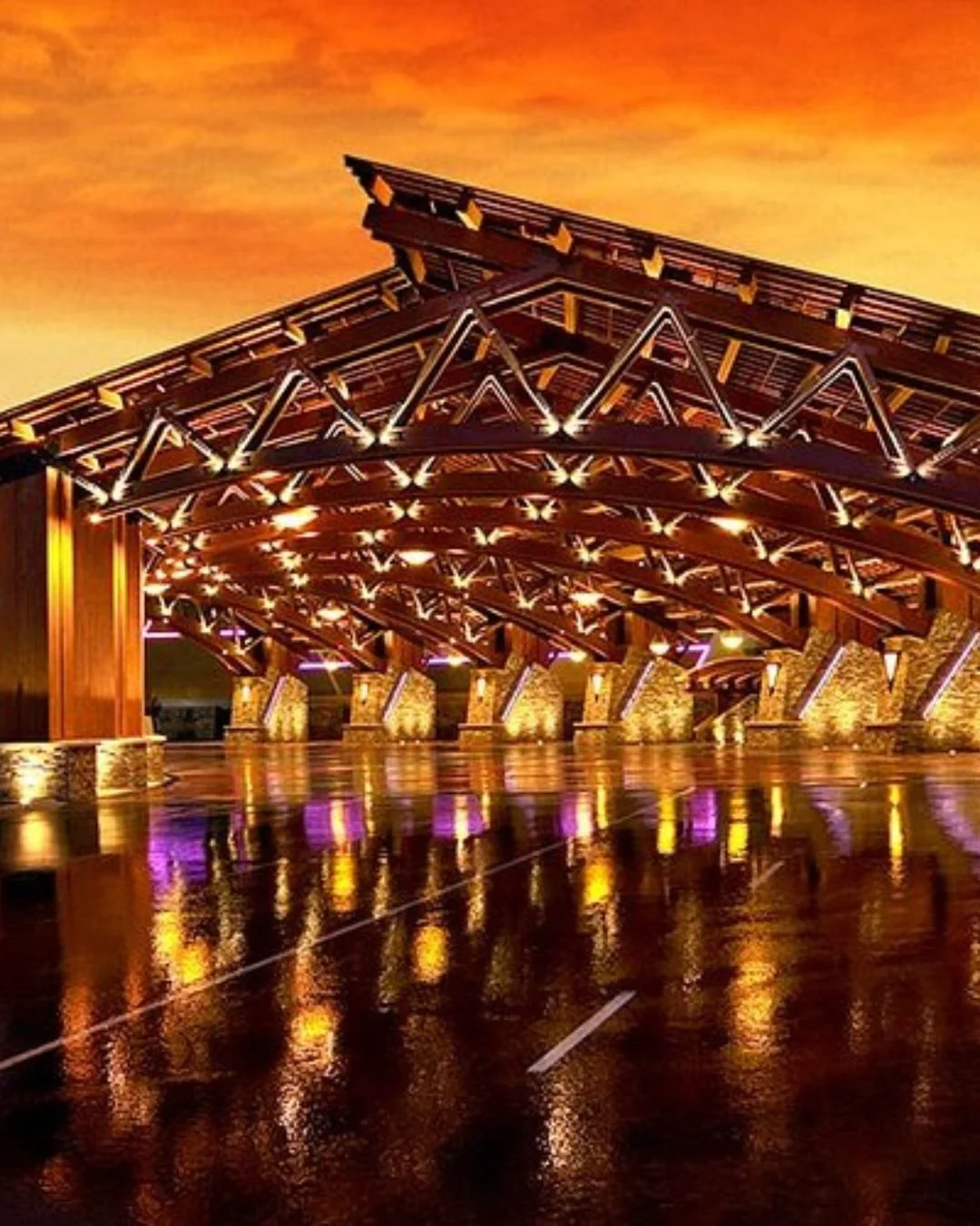 Red Hawk Casino entrance at sunset in Shingle Springs, California, featuring modern architecture, dining, gaming, hotel, and entertainment in the Sierra foothills.