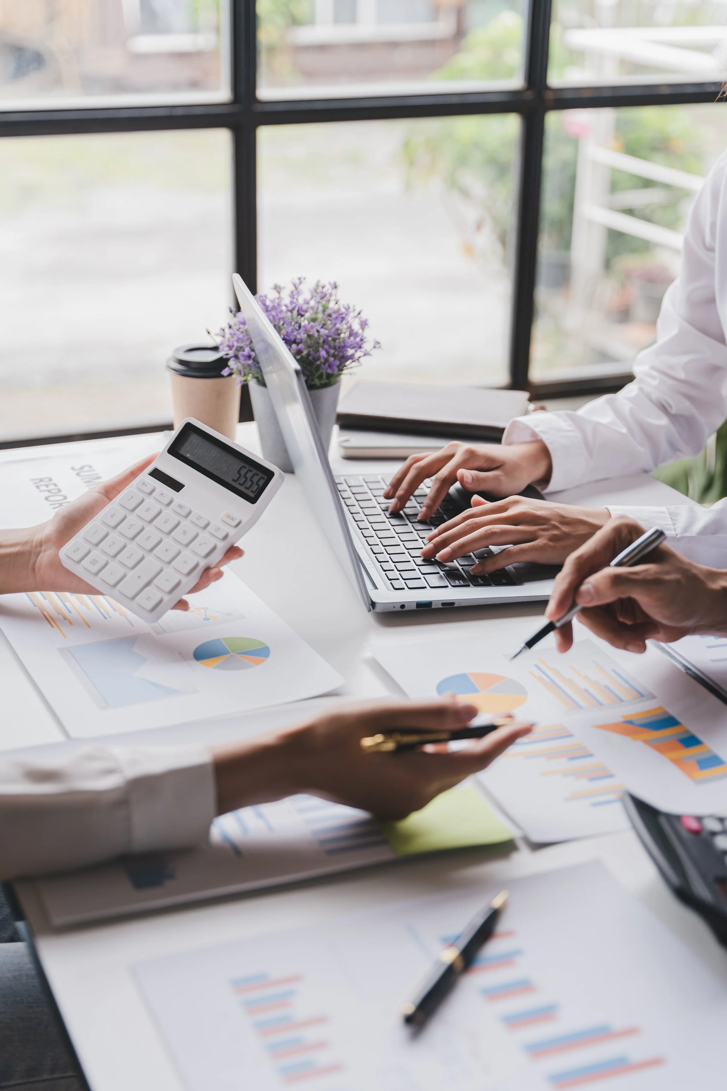 Toronto CPA team collaborating on financial statements, bookkeeping reports, and tax planning for a business client