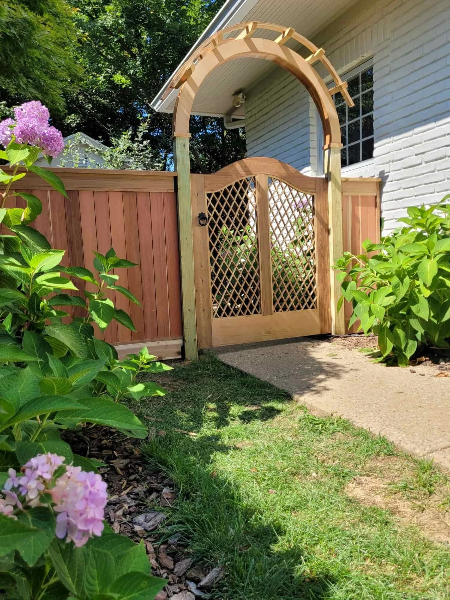 cedar gate with arbor for future wisteria