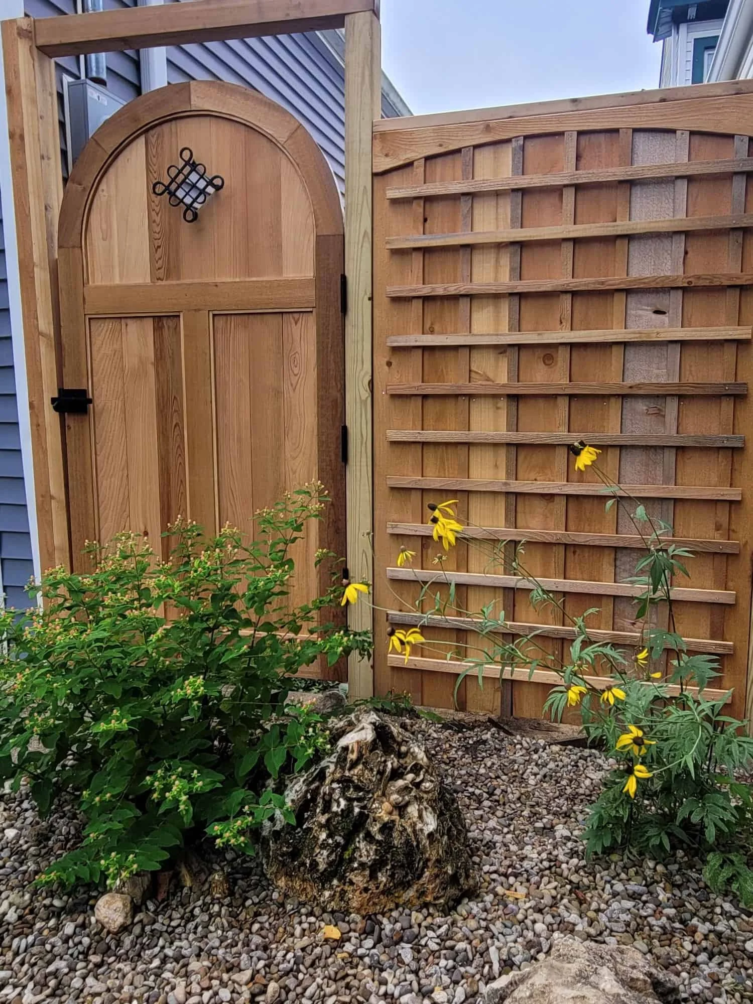 arched gate with lattice panel
