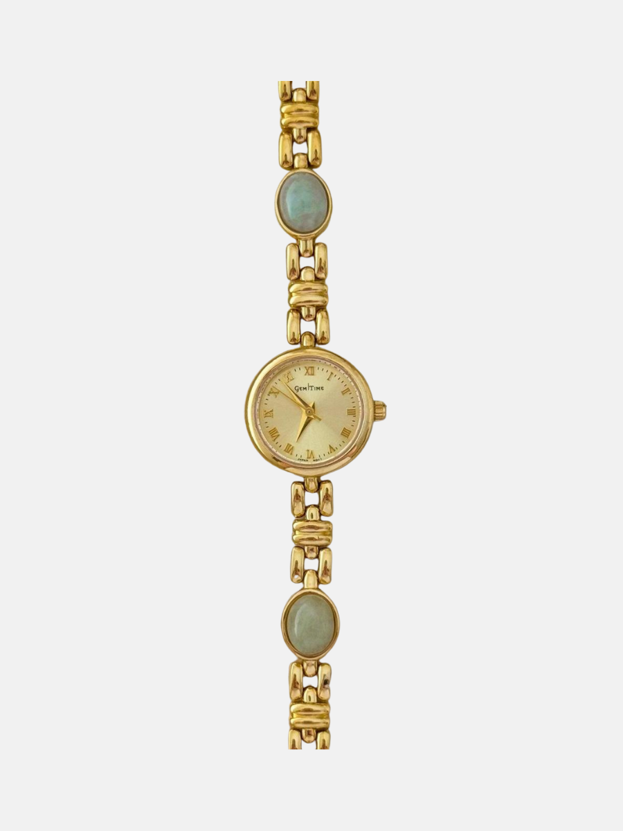 Ornate gold watch with genuine jade $139.00