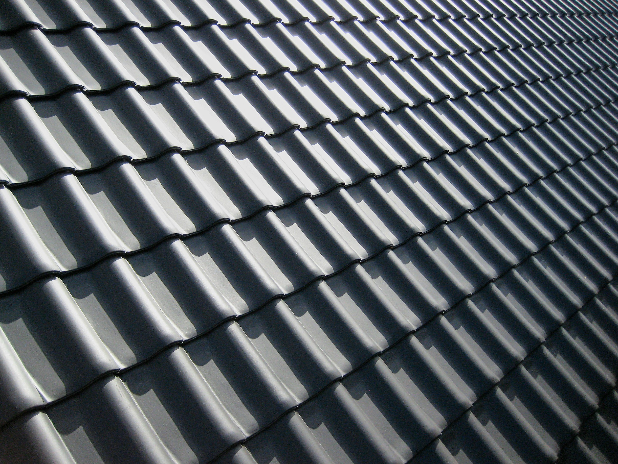 Why More Oklahoma Homeowners Are Switching from Shingles to Metal Roofs