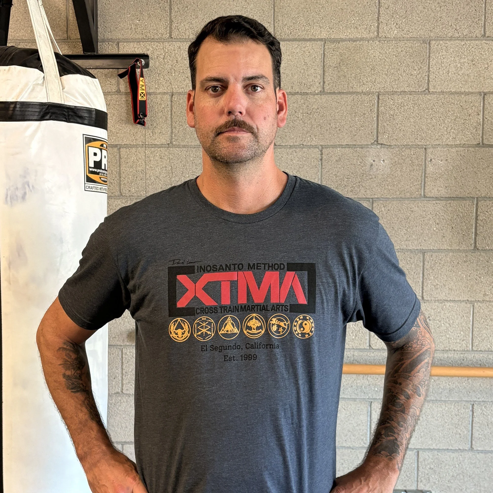 XTMA-Inosanto-Method-Tee-Dark-Heather-model.jpg