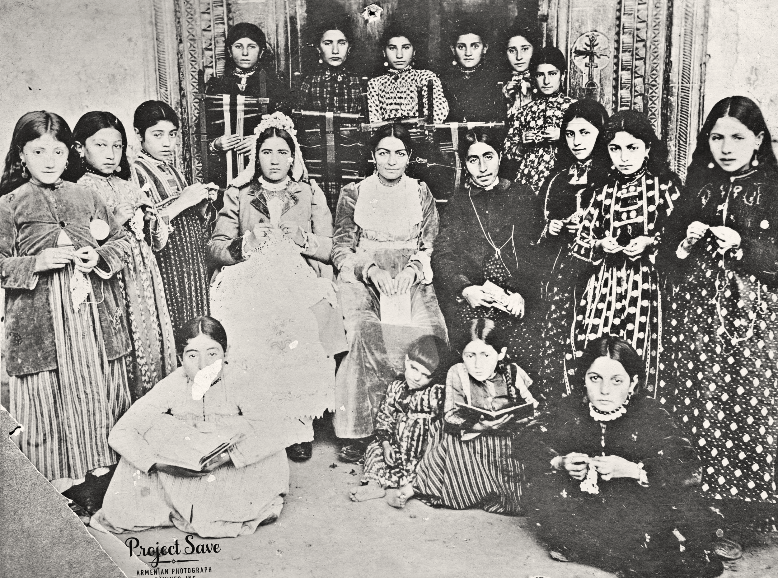 Black and white image of Armenian orphans in Garin displaying needlework