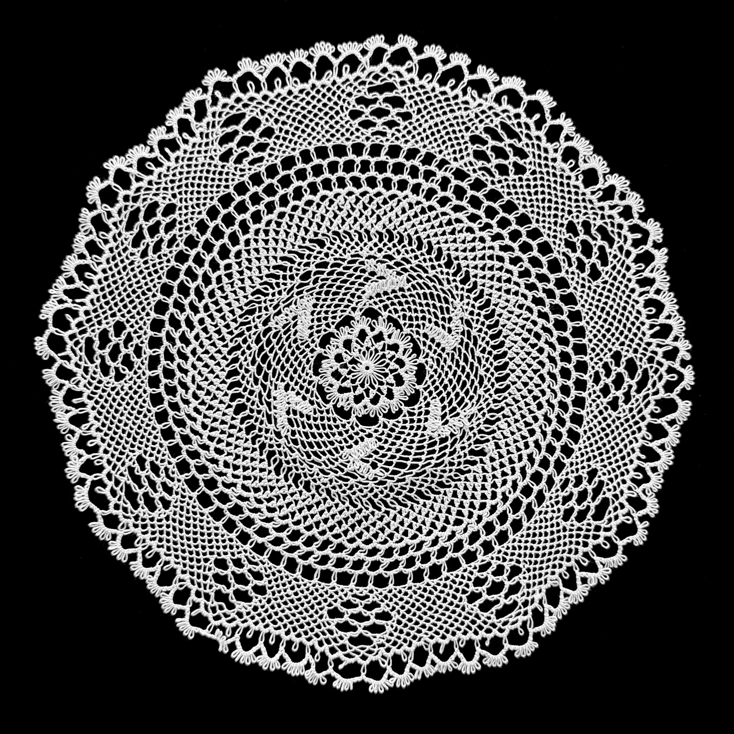 Mikayla Kurkjian, large needlelace doily doily, Maryland, 2023. Received the Chesapeake Region Lace Guild Special Award in the 2023 Maryland State Fair. Photo credit: @ Mikayla Kurkjian 2026. 