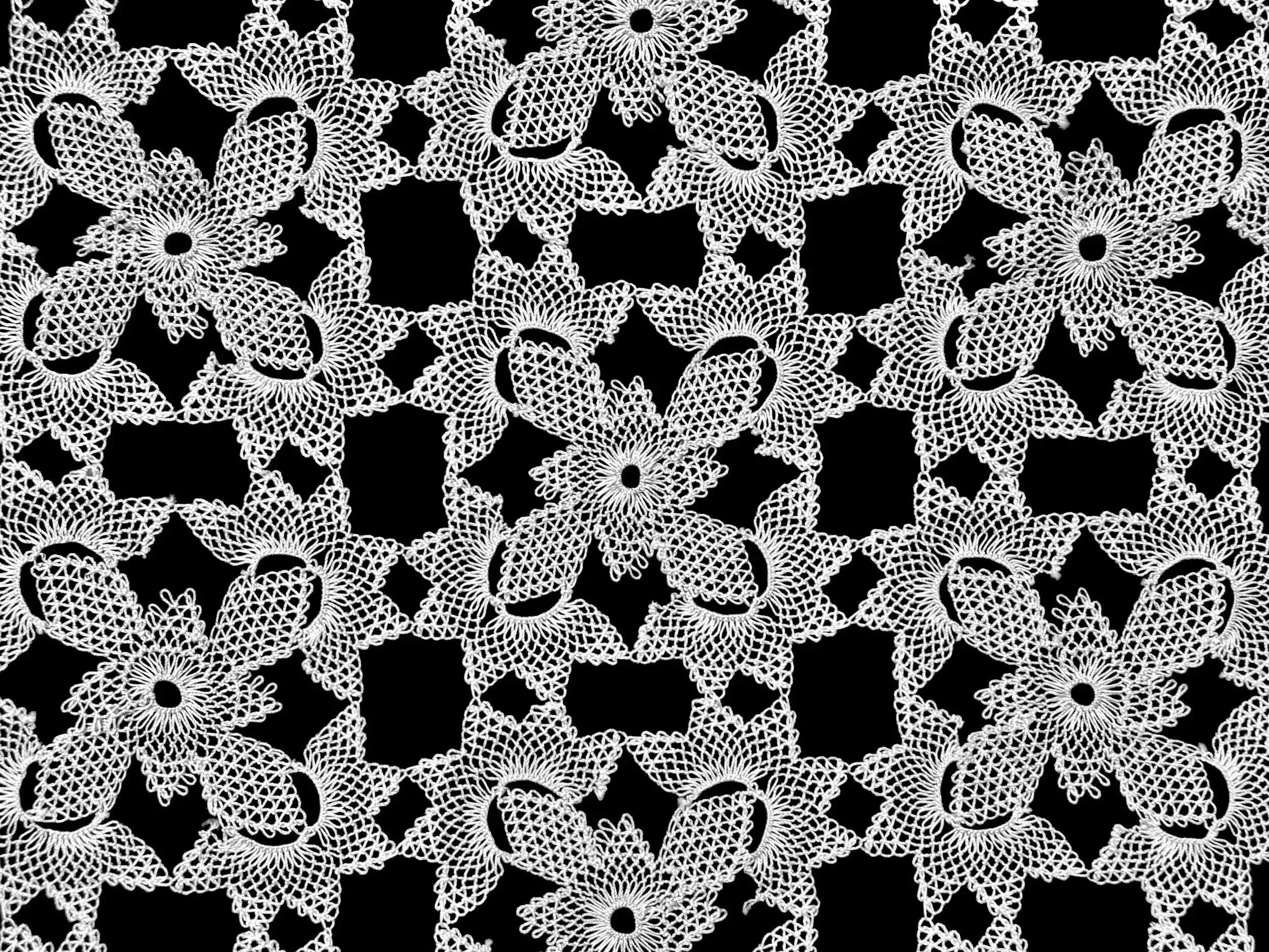 Black and white photo of Armenian needlelace doily