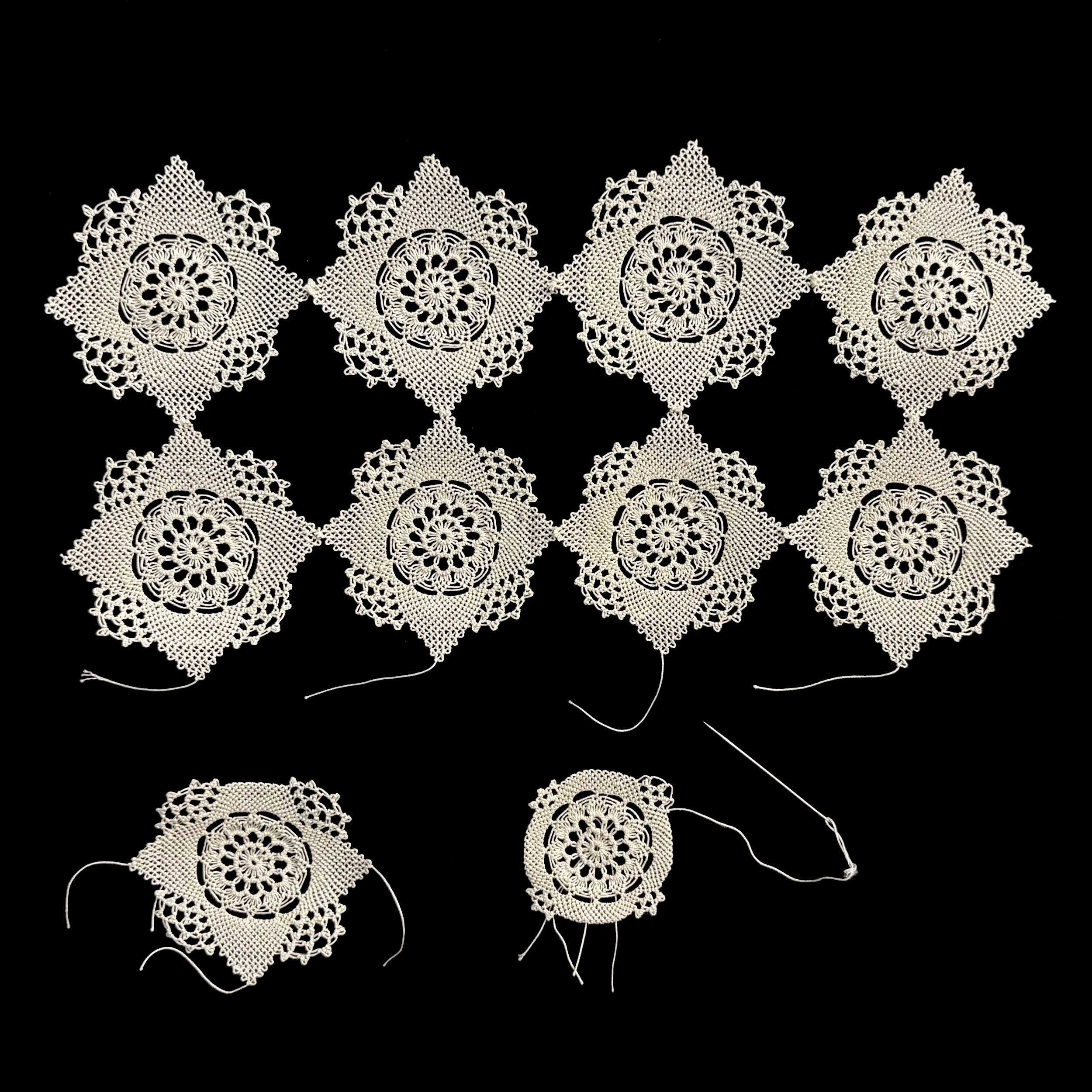 Mikayla Kurkjian,  My Grandmother Before Me , work in progress, eight completed and two unfinished medallions, a continuation of previous work based on Mikayla's grandmother's needlelace table cover. Photo credit: @ Mikayla Kurkjian 2026. 