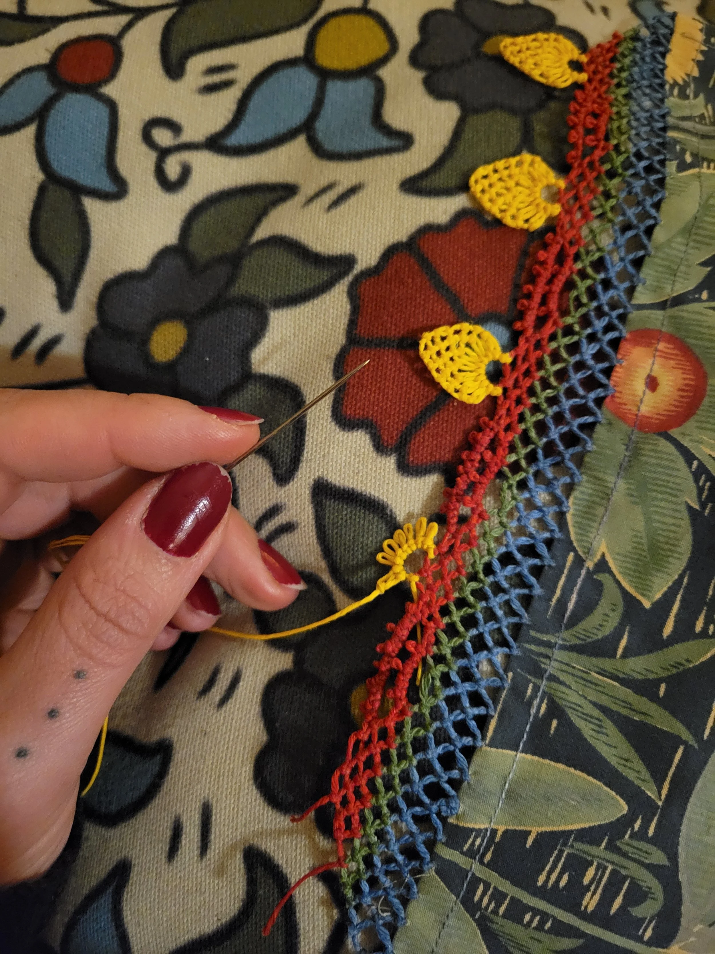 Ali Cat, screenprinted banner with janyak border-in-process, cotton and linen thread, Portland, Oregon, 2024. Photo credit: © Ali Cat 2024.