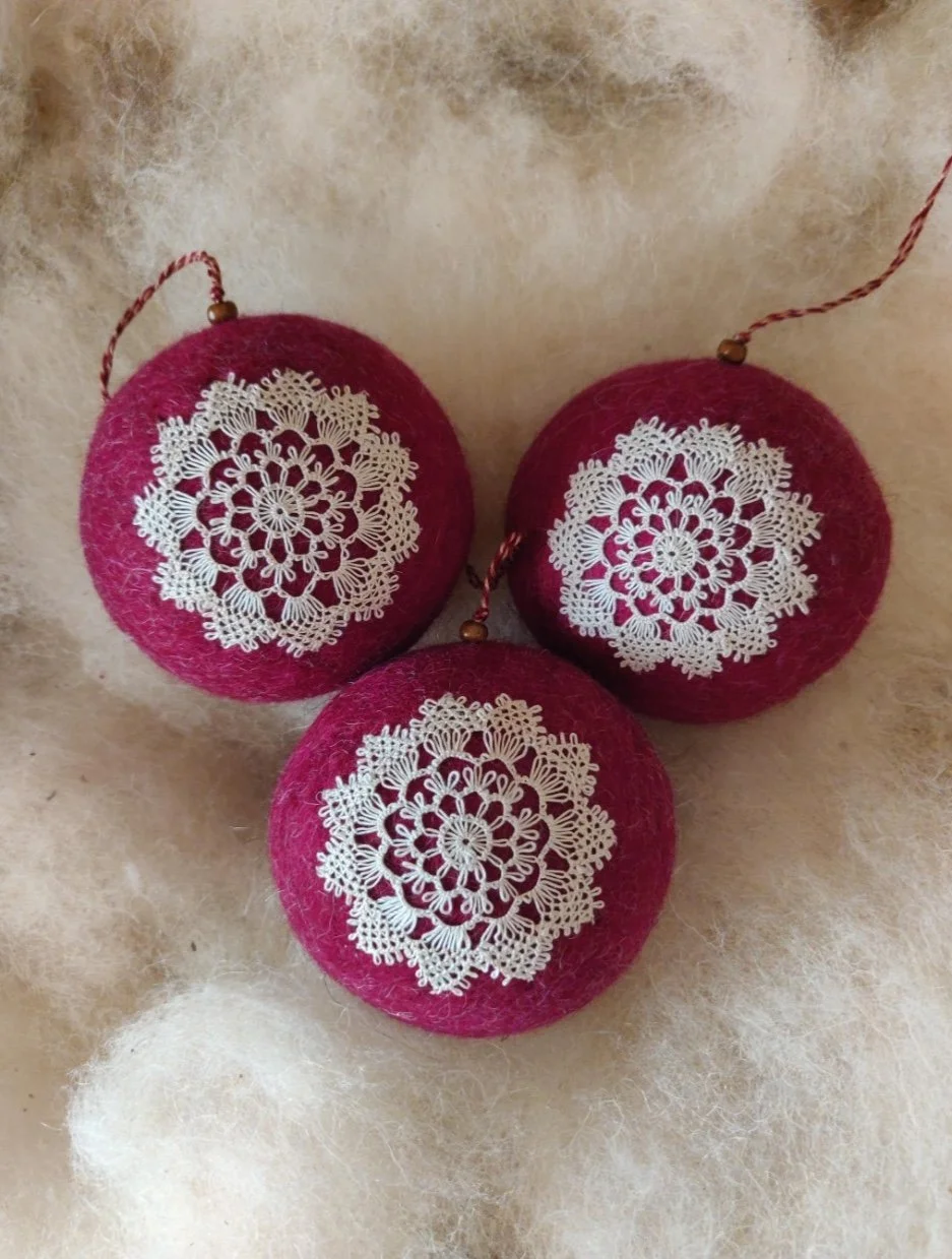 Maral Sheuhmelian, needlelace and wool felt ornaments, Yerevan, Armenia, 2018. This design is one of several Maral developed for a collection of needleworked Christmas ornaments. Photo credit: © Maral Sheuhmelian 2026.