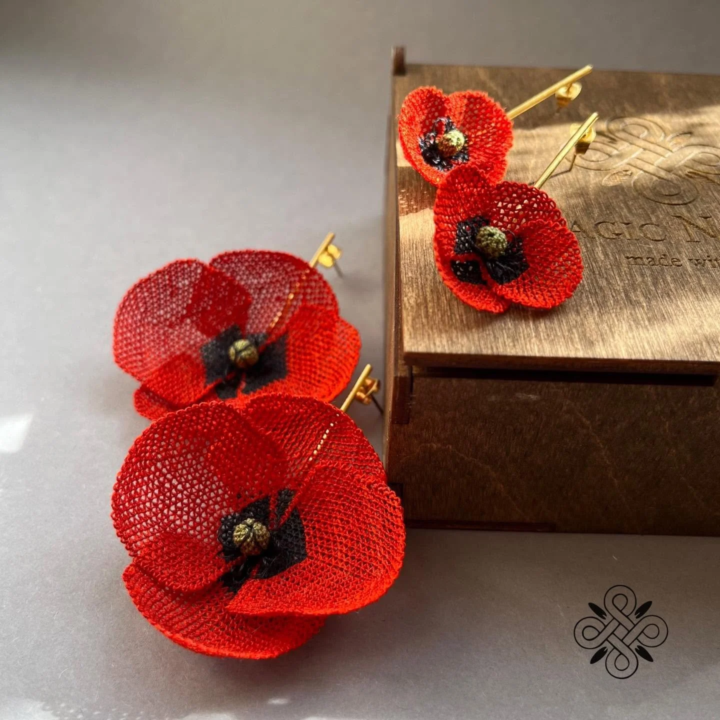 Iskuhi Sargsyan, needlelace earrings evoking poppies, Yerevan, Armenia. Photo: © Iskuhi Sargsyan 2025.