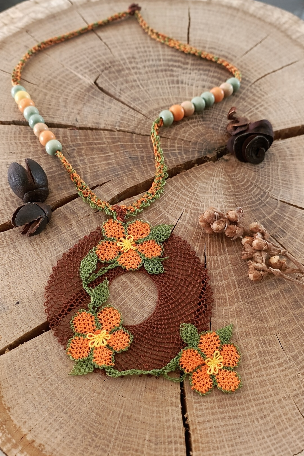 Linda Oral Şener, colorful crocheted and beaded necklace with needlelace pendant, Samandağ, Hatay, Turkey. Photo: © Linda Oral Şener 2026.