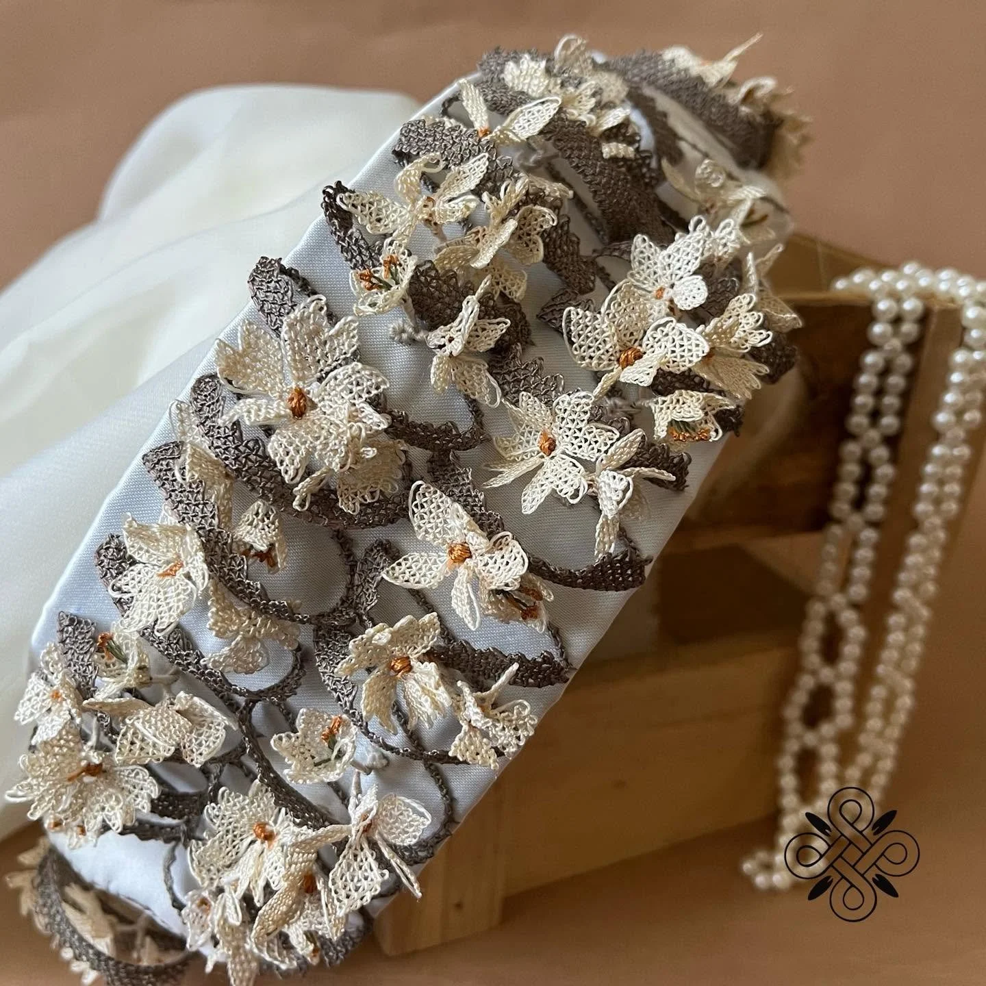 Iskuhi Sargsyan, bridal headdress with needlelace flowers and pearl accents, Yerevan, Armenia. Photo: © Iskuhi Sargsyan 2025.