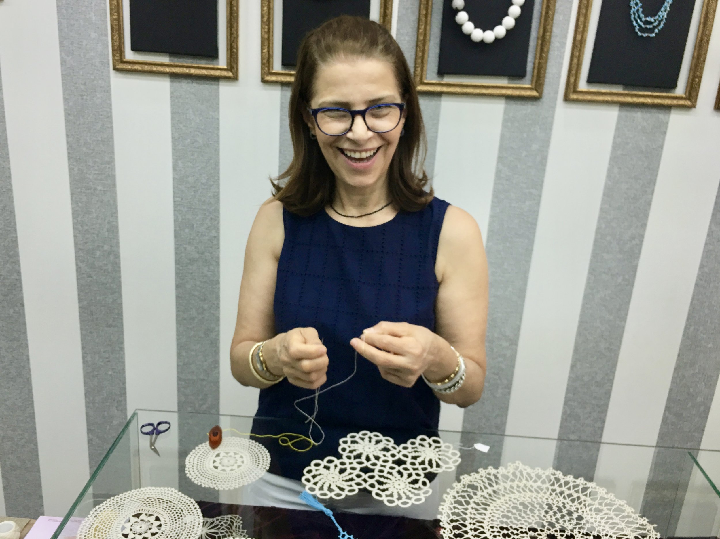 Wafa Zaher, Palestinian artist and needlelace maker in her shop in the Old City of Nazareth, Israel. 
Photo credit: © Deborah Valoma 2019.