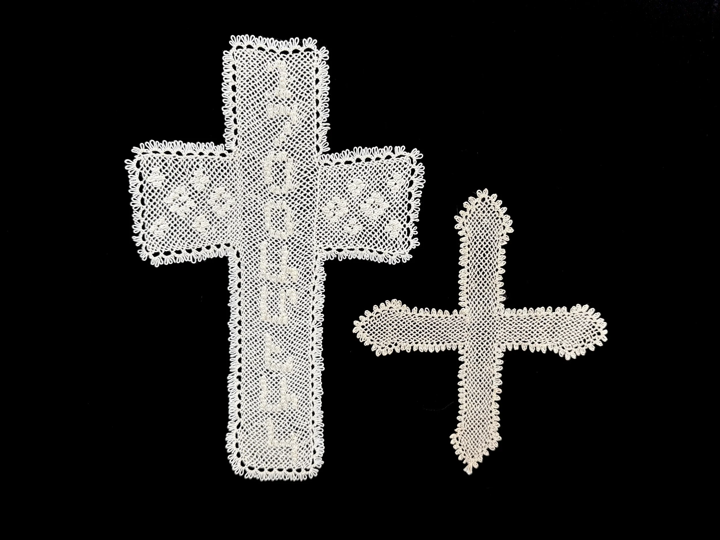 Azadig Bidanian Archive. Unknown maker, needlelace crosses, unknown location, ca. 2001, the one on the left commemorating seventeen hundred years of Armenian Christianity.

Photo credit: © Deborah Valoma 2025.