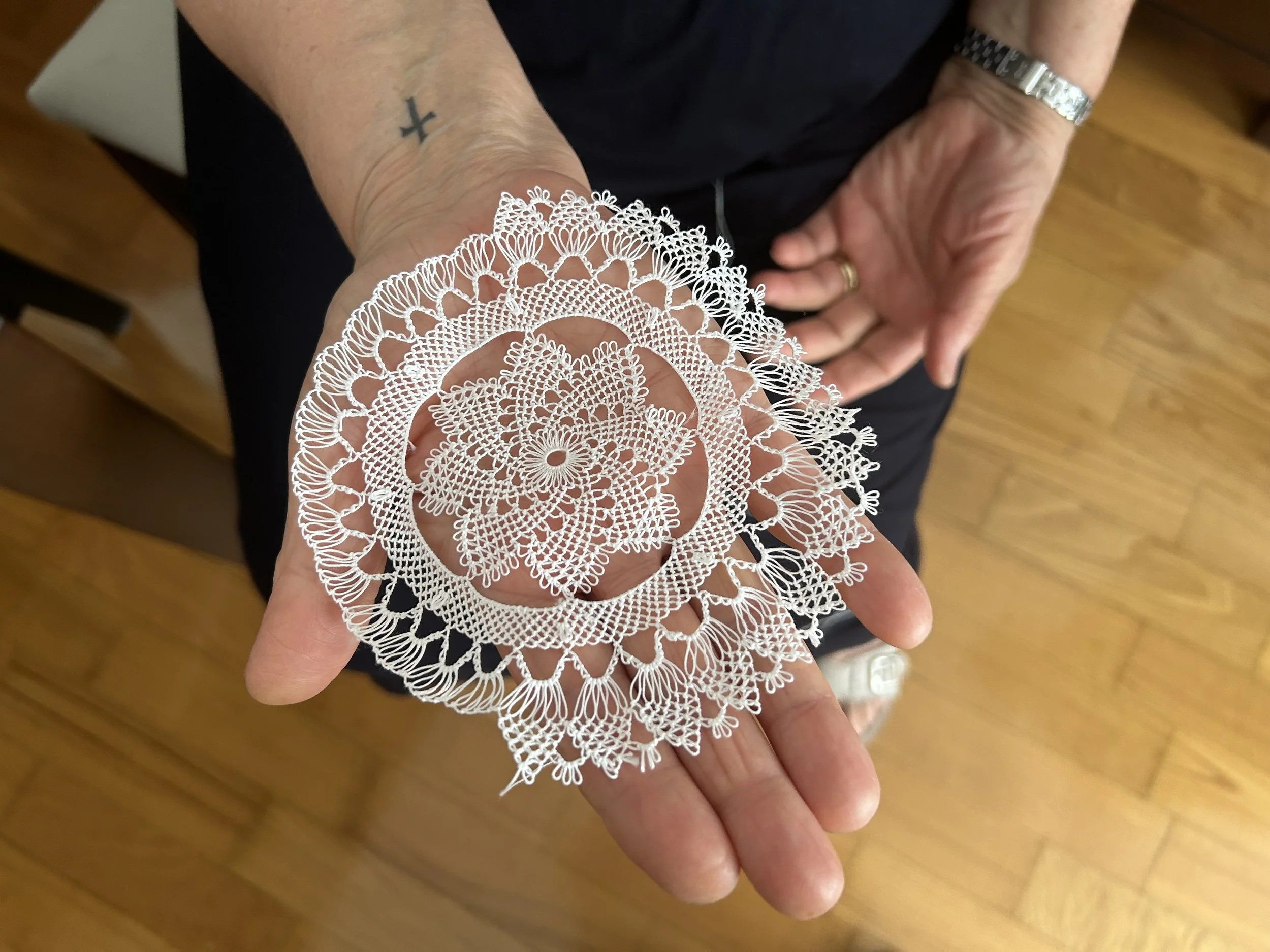 Dzaghig Chitchi holding in-process doily, Şişli, Istanbul, Türkiye, 2024. Photo credit: © Deborah Valoma 2024.