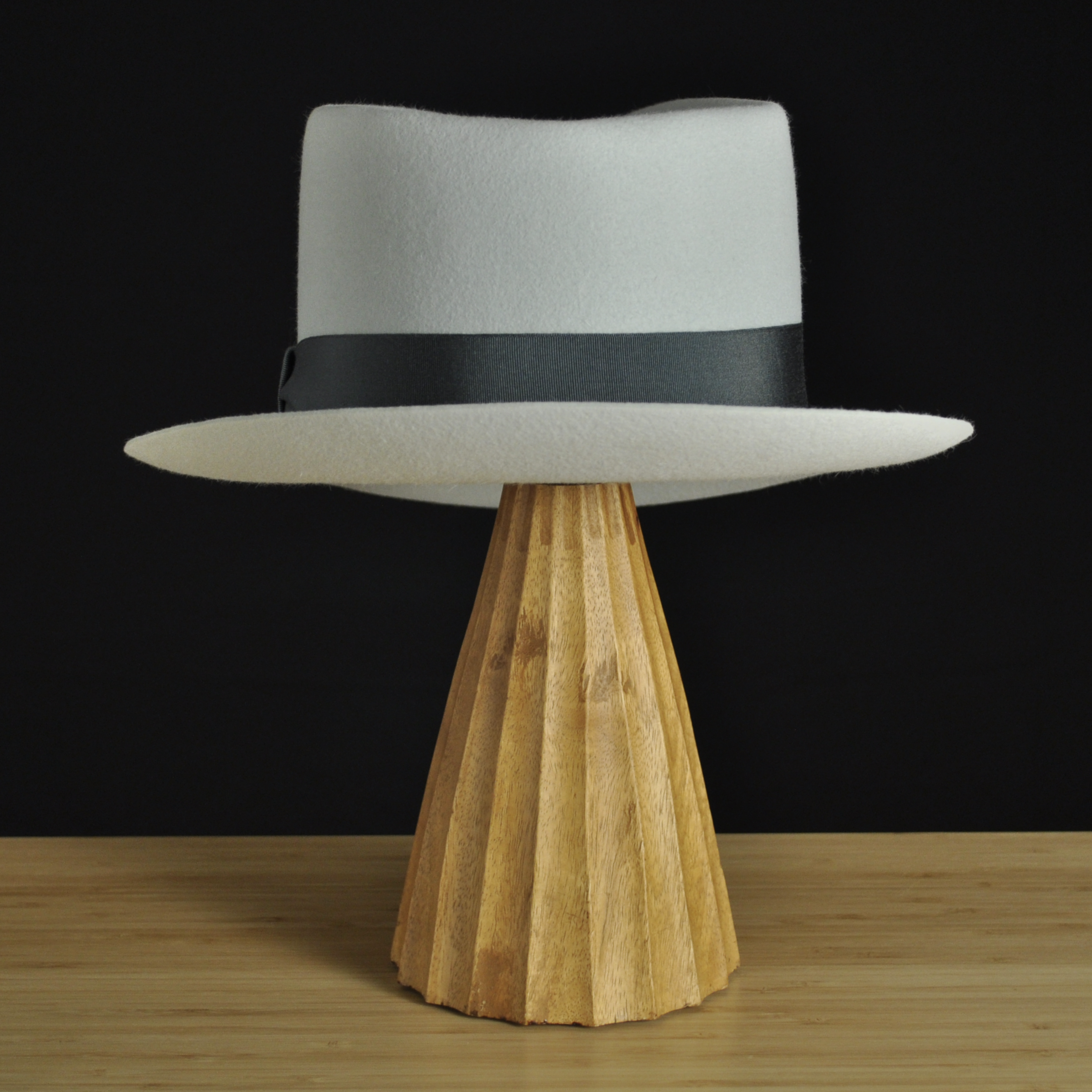 Rear view of The Sunsetter silvermist felt fedora with a softly pinched crown, medium snap brim, and contrasting dark grosgrain ribbon with a modern tie (no bow).