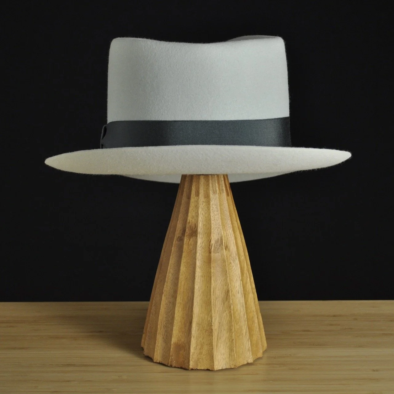 Rear view of The Sunsetter silvermist felt fedora with a softly pinched crown, medium snap brim, and contrasting dark grosgrain ribbon with a modern tie (no bow).