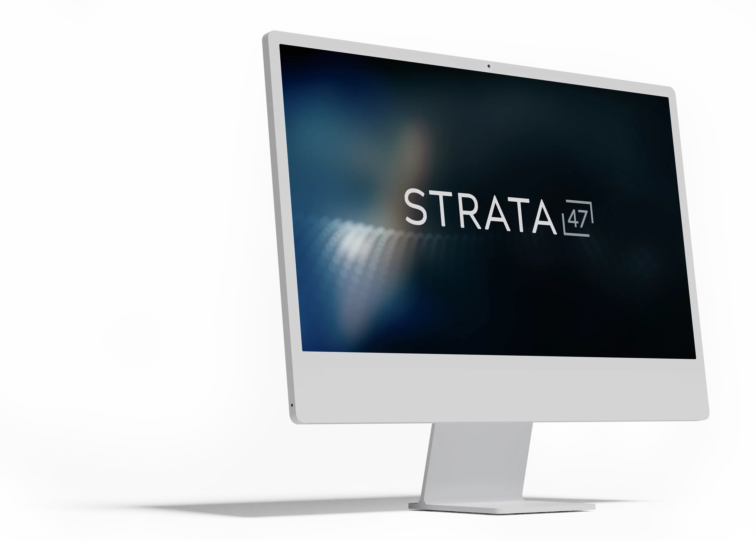 Mac featuring the Strata 47 logo on the screen.