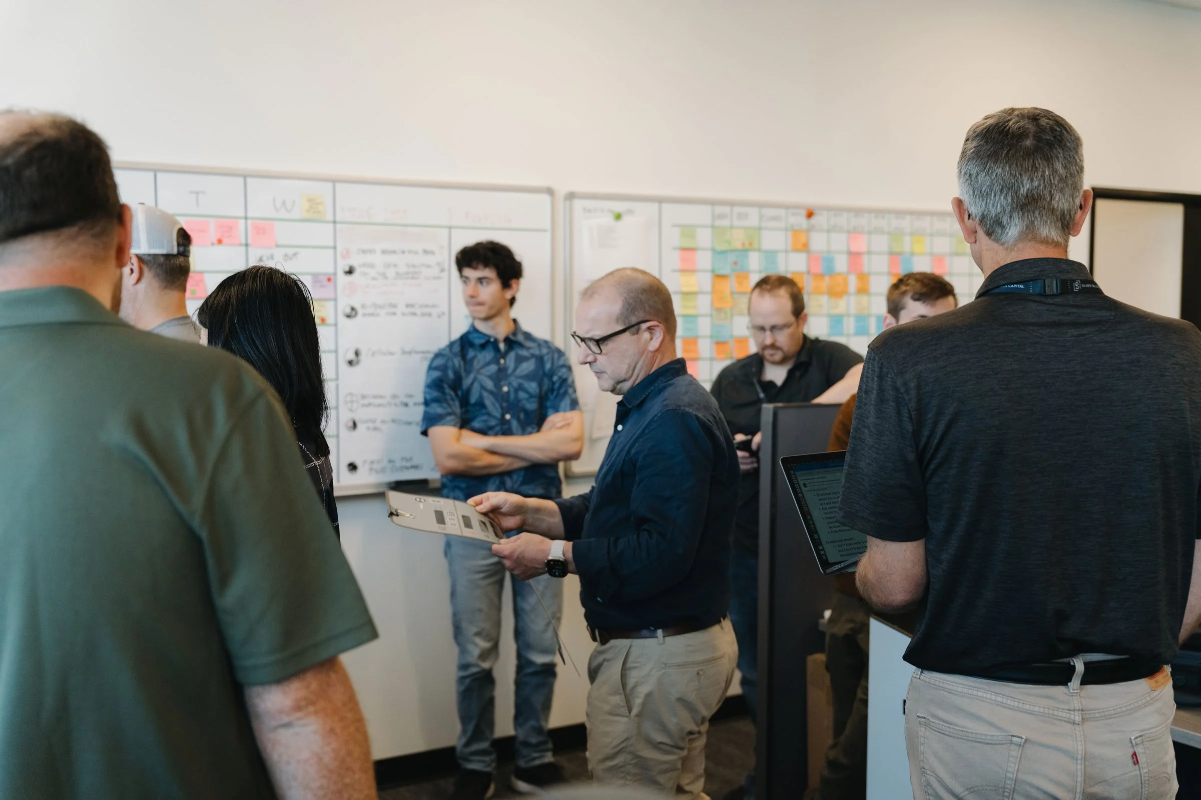 Silver Falls Way team in an active Kaizen meeting, working together through their differentiated model for growth.