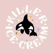 A logo with the words 'Killer Whale Cream' arranged in a circular pattern around an illustration of a killer whale jumping out of the water, with small stars around it.