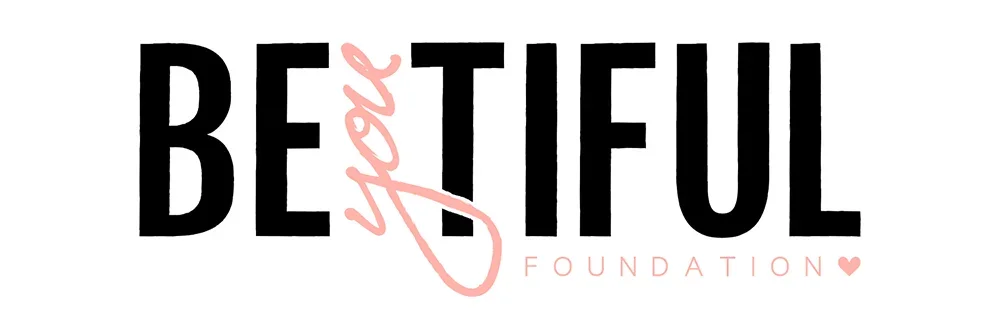 Text that reads 'BE THE BEST' with 'the' written vertically in pink cursive. Below are the words 'FOUNDATION' with a small pink heart.