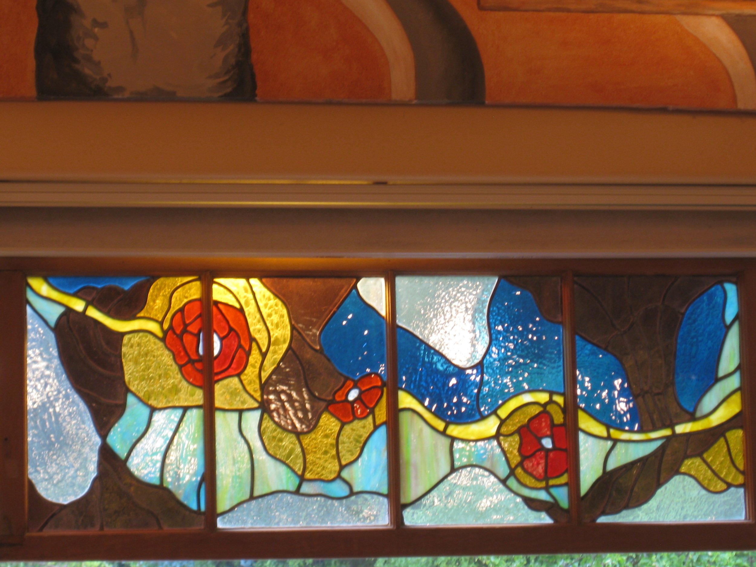 Leaded stain glass, framed, 2 ft by 5 ft.
