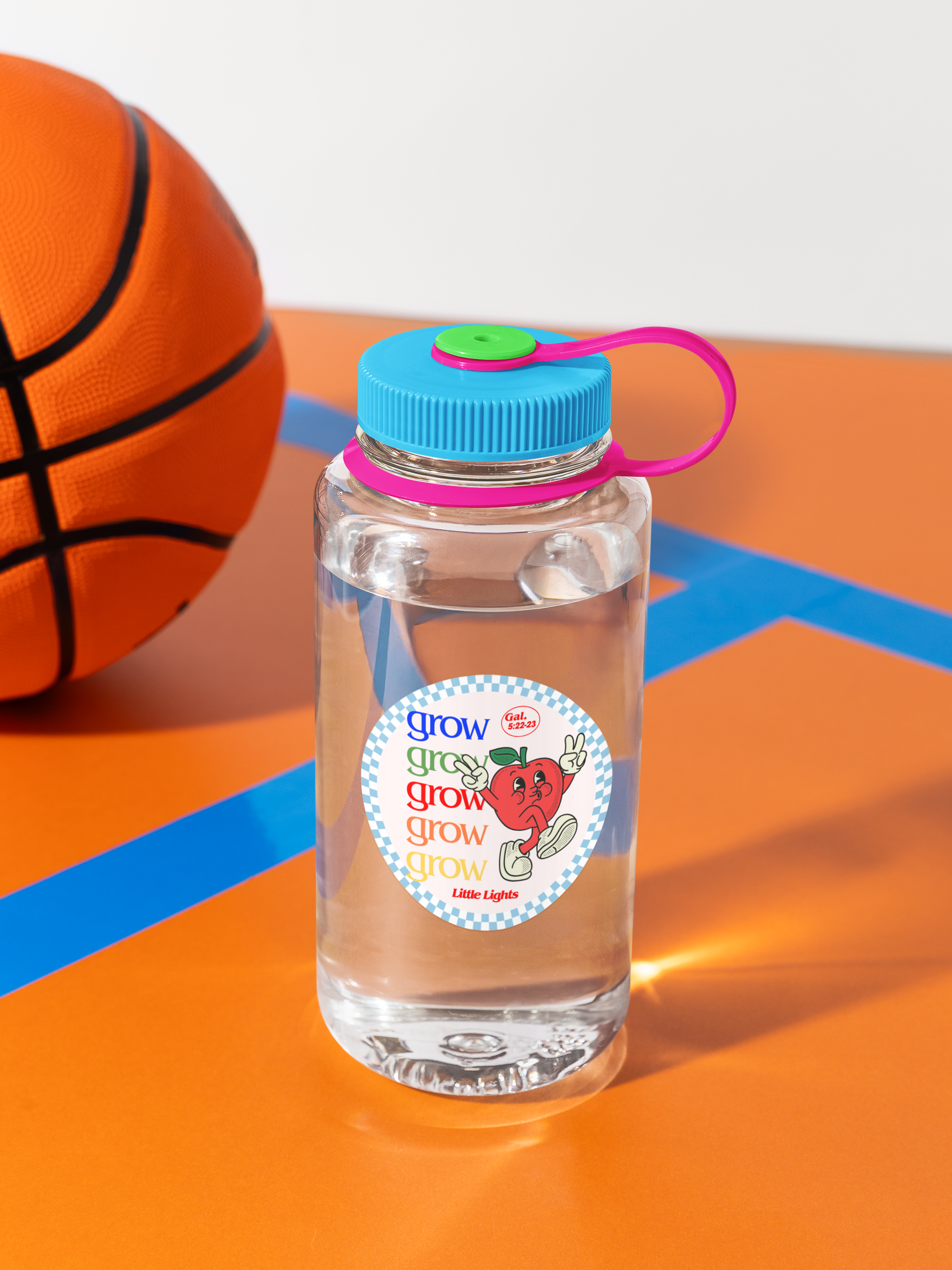 narrow-mouth-plastic-water-bottle-mockup-featuring-a-basketball-court-and-a-ball-m57977.png