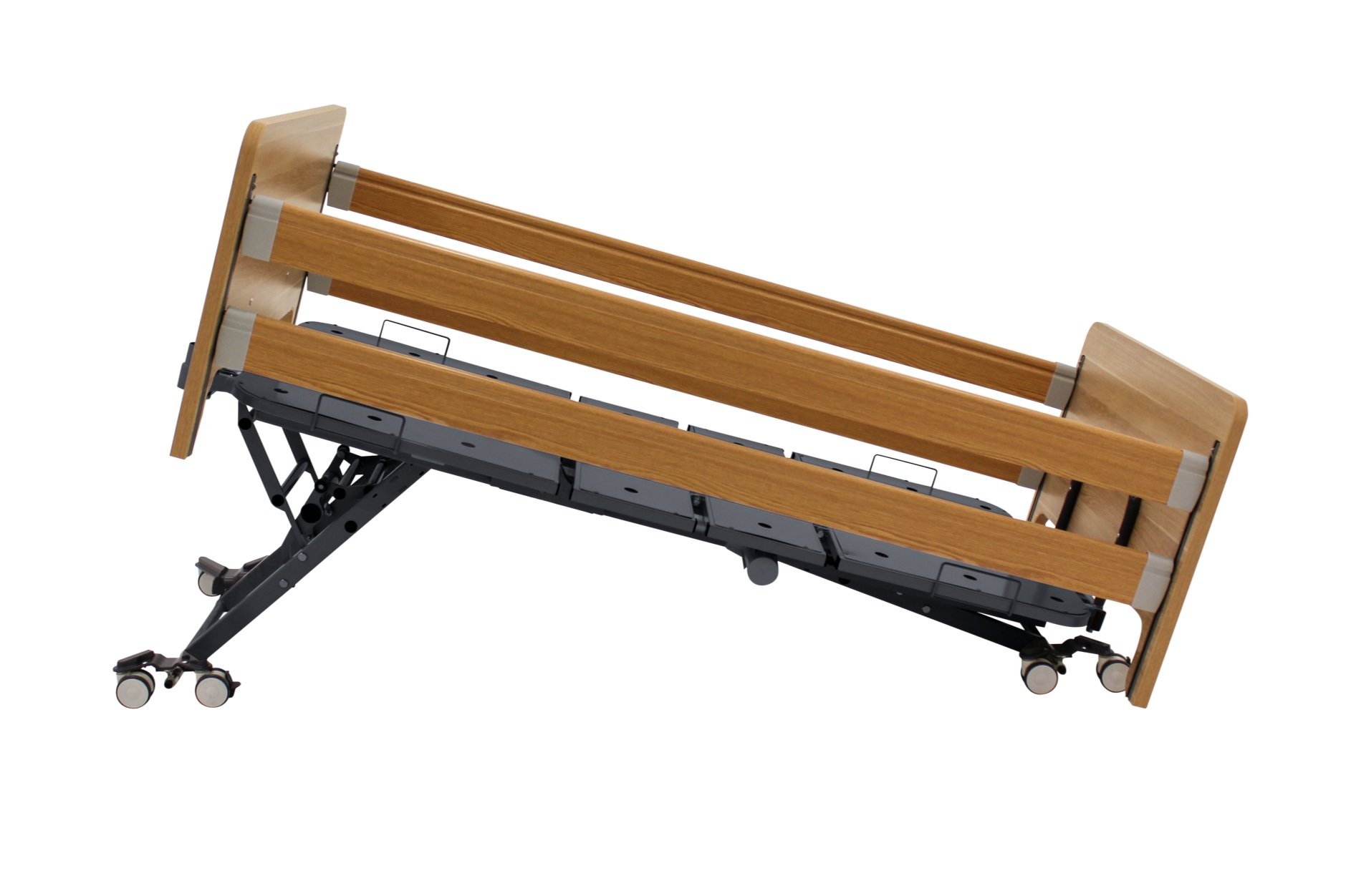 Adjustable wooden hospital bed on castor wheels, partially elevated.