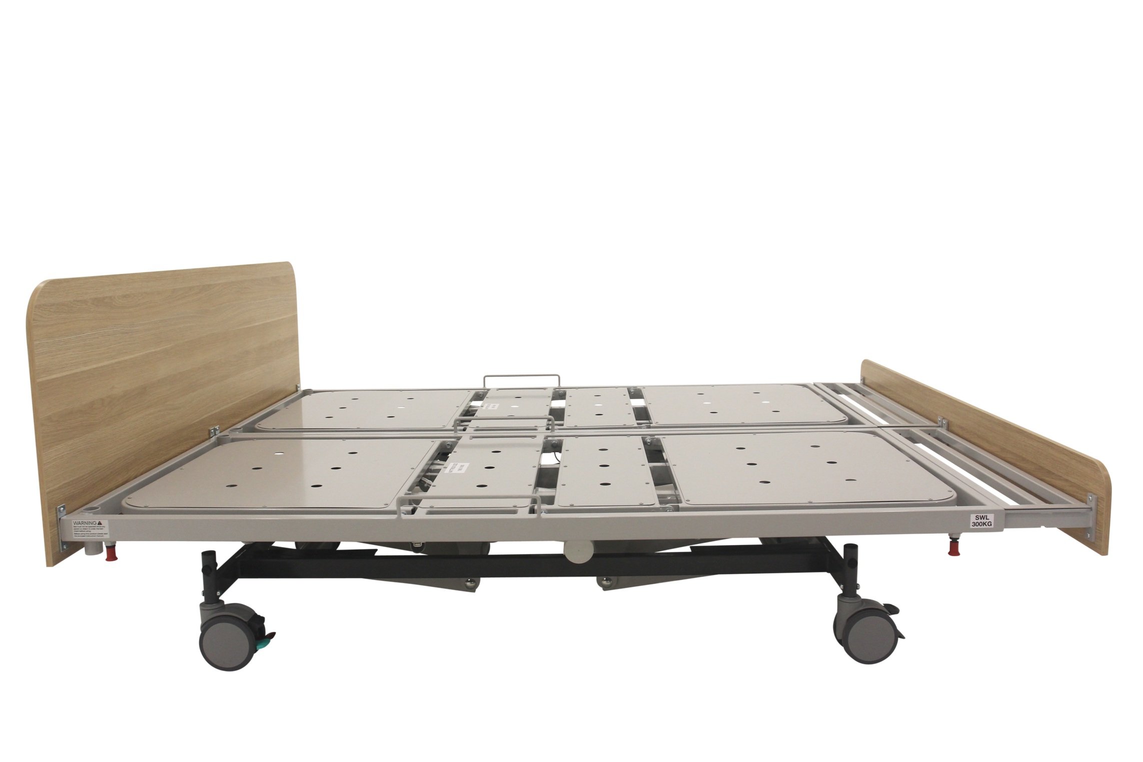 Adjustable hospital bed with wheels and metal frame.