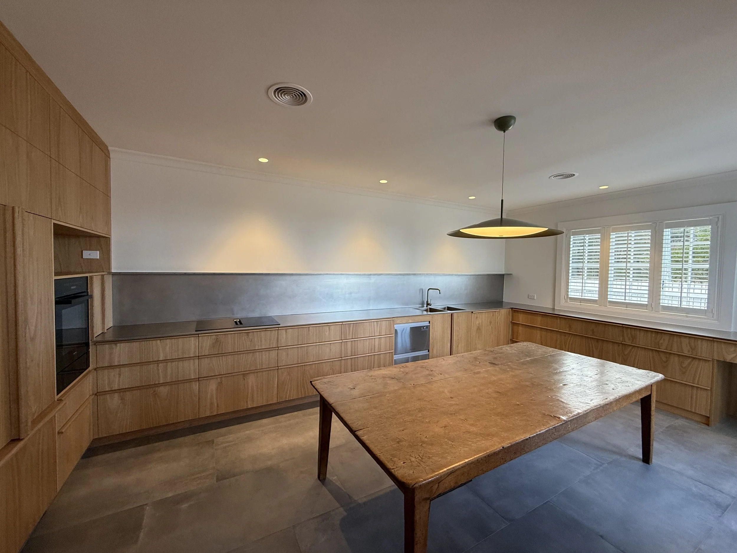 5mm Stainless Steel plate bench top with an oscillated finish, installed in a private residence at Kingston.