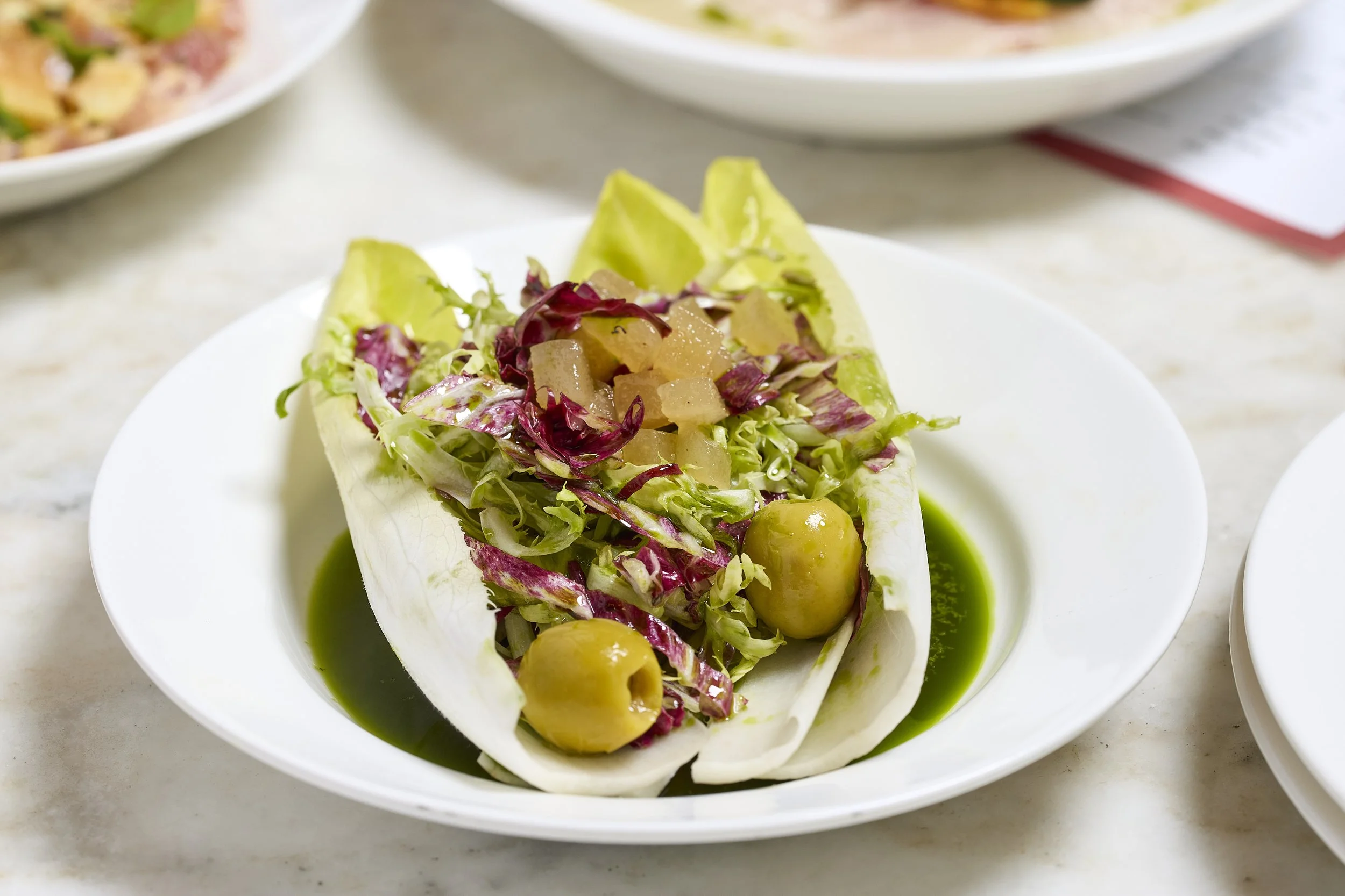 Endive Salad  Radicchio, olives, quince paste, pepper, parsley dressing
苦白菜沙律, 橄欖, 木梨糕, 歐芹醬
