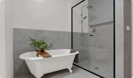 Modern bathroom with a freestanding bathtub and a glass-enclosed shower