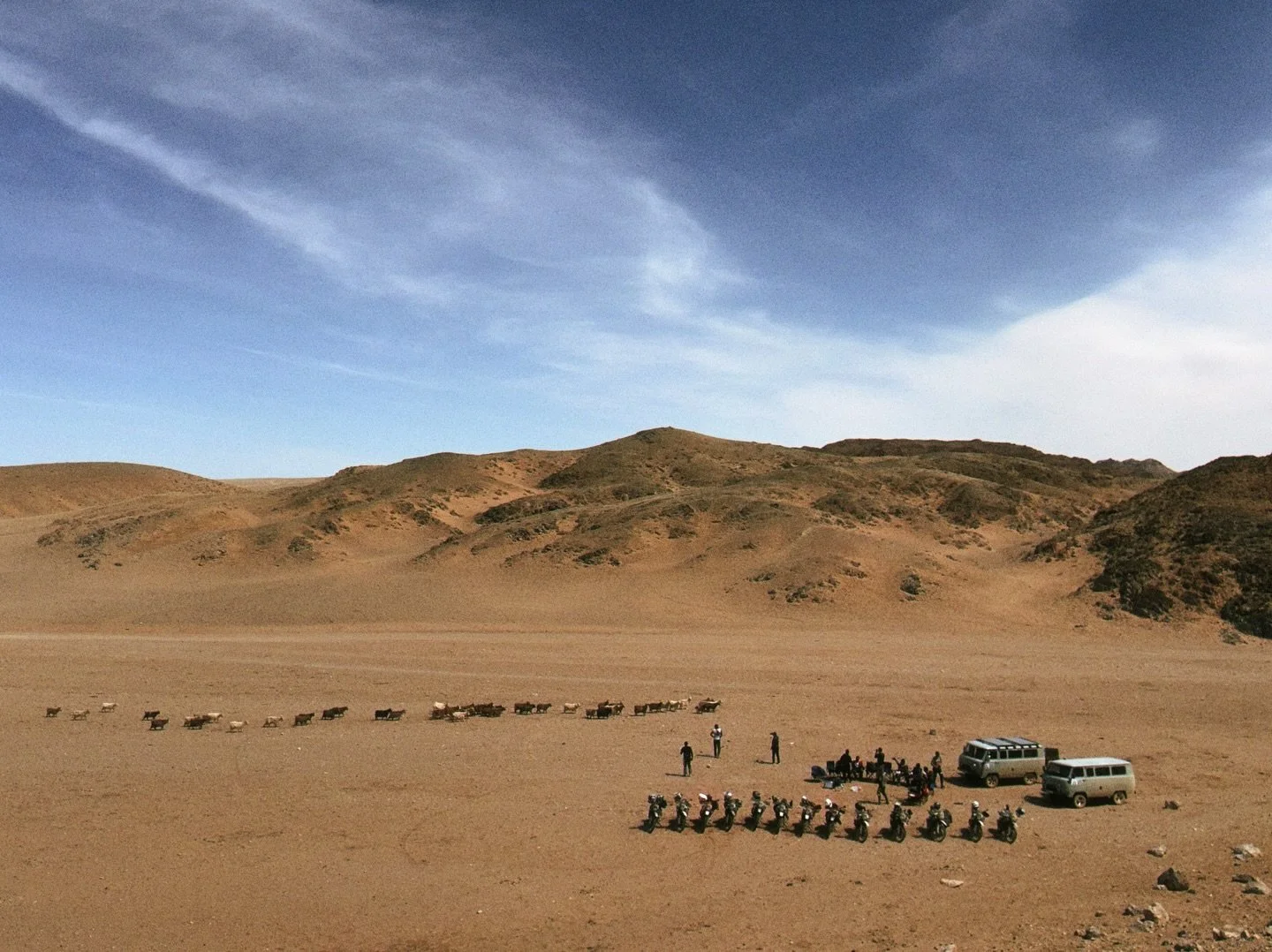 &bull; Lunch in the middle of nowhere&mdash;Gobi style 🇲🇳

Same spot, different views. Three angles of pure Mongolia: endless steppe, open skies, and a quiet moment to refuel in the wild. Surrounded by nature, far from roads and cities&mdash;this i