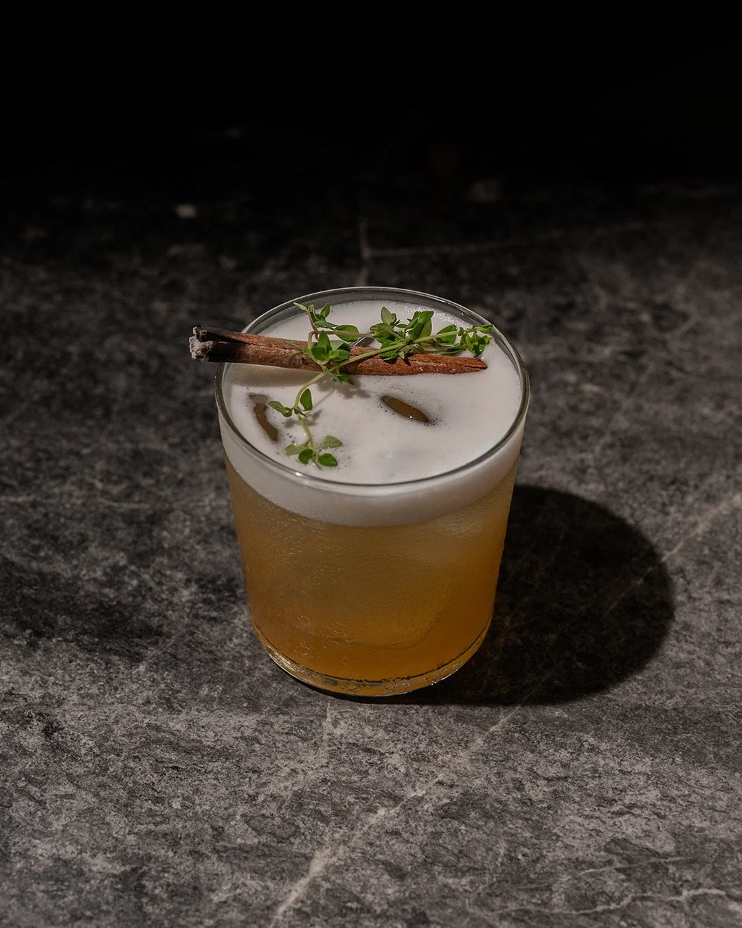 Smoky, spiced, and perfectly lifted / Spiced whiskey sour w whiskey, st germain elderflower liqueur, spices, citrus, bitters, foam