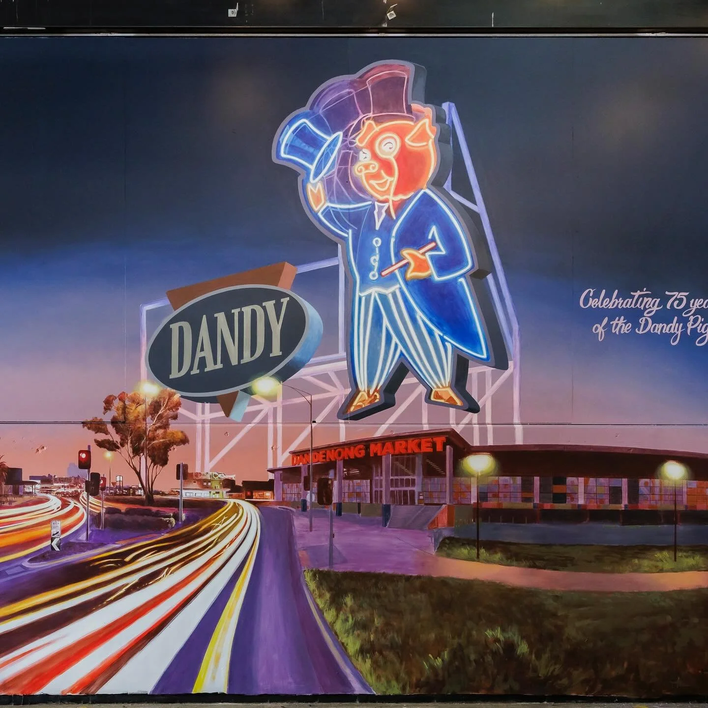 A tip of the hat to the Dandy Pig at Dandenong Market 

The Dandy Pig, the beloved, top-hatted neon mascot, has been welcoming locals since the 1950s, signaling your arrival into Dandenong with style and charm. After decades of love, restoration, and