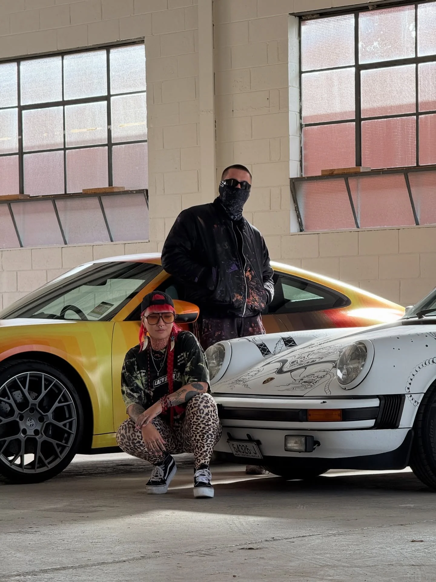 A behind the scenes view of these two legends customising a pair of #porsche 911's for @walltowallfestival . 

Two different artists, ( @drez , @squid.licker ) with totally different styles taking on two very different generations of the classic spor