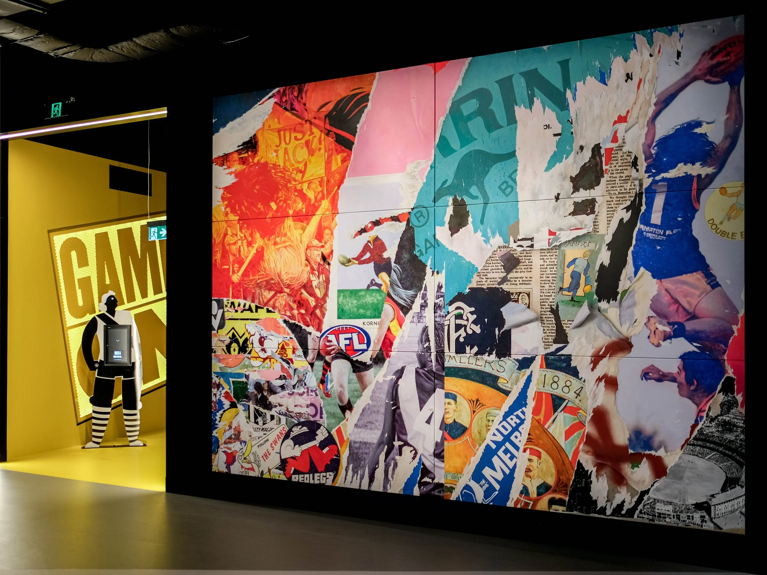 an image of a mural painted at the mcg celebrating 100 years of afl history