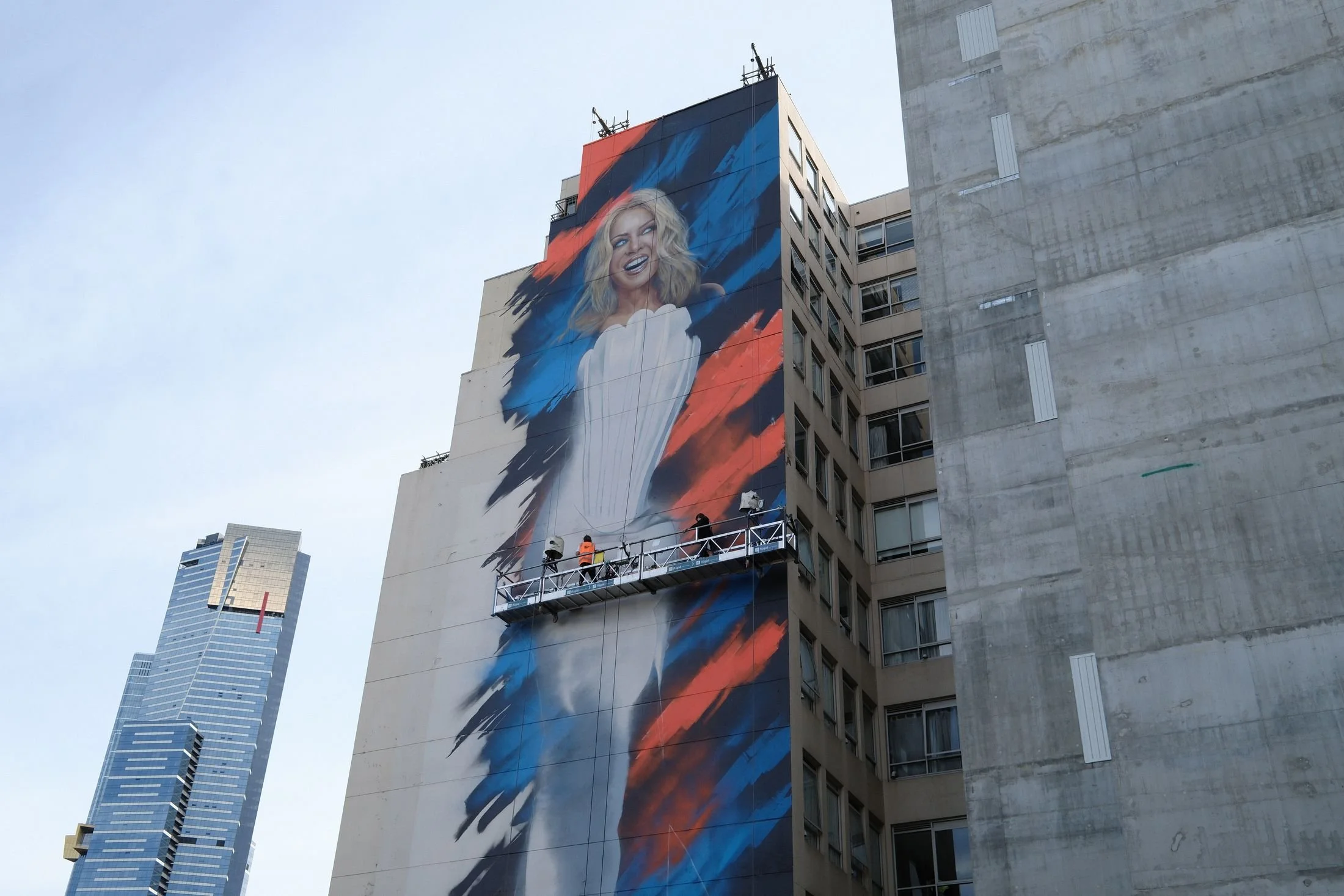 Adnate's 13-storey portrait of Kylie Minogue on Clement House, Flinders Street, Melbourne