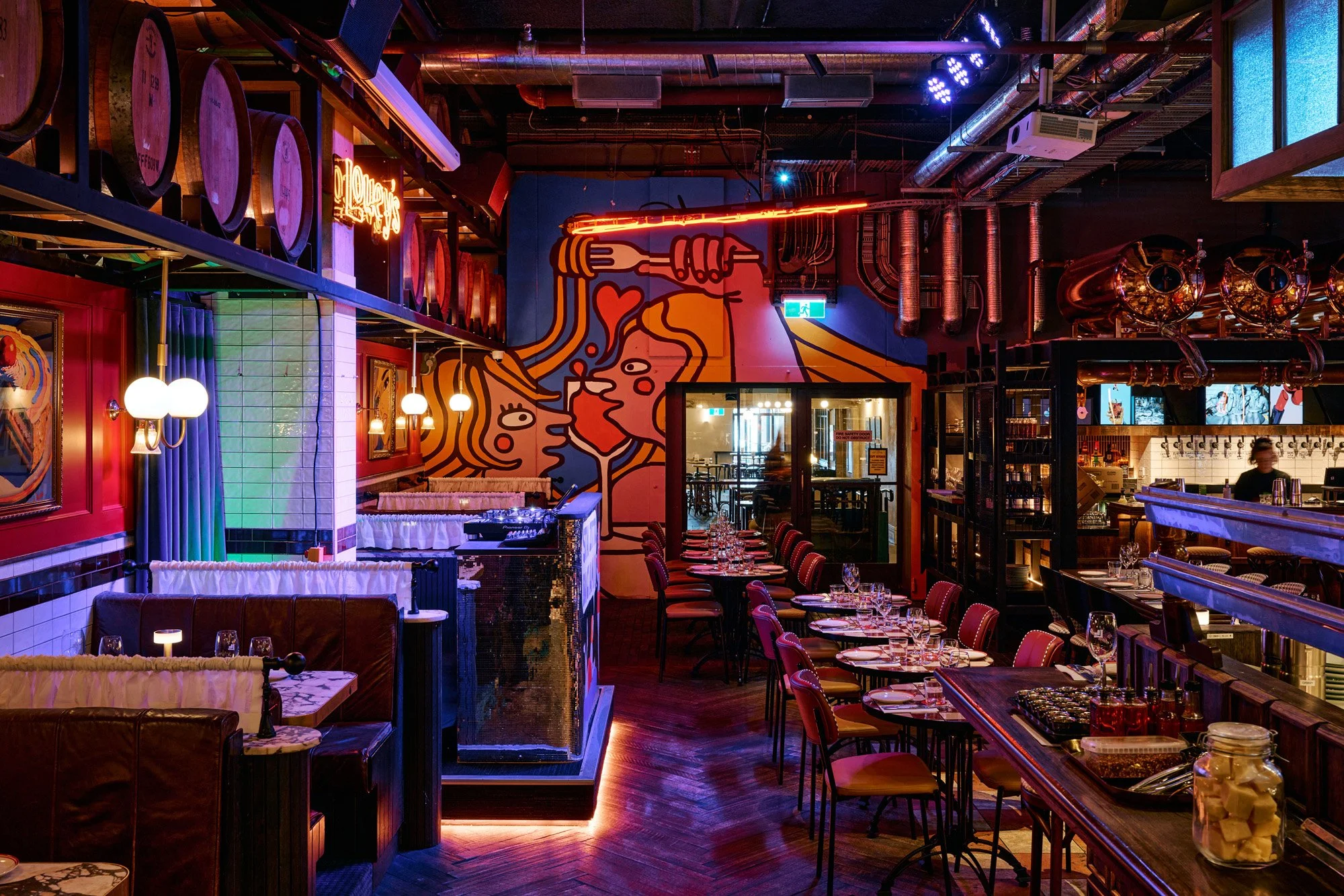 an iamge of a mural on a public housing building by artist adnate