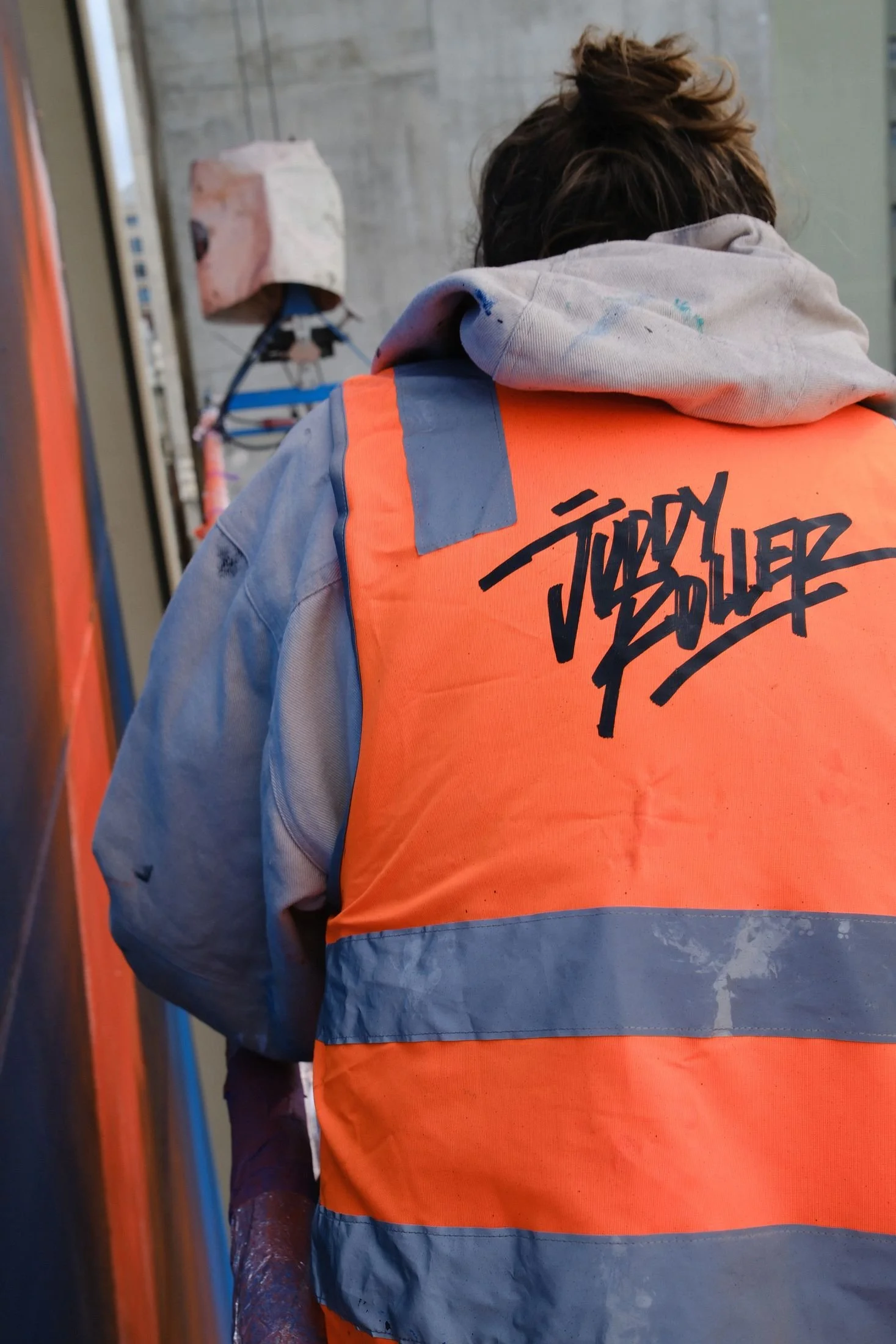 Juddy Roller crew member at work on the wall