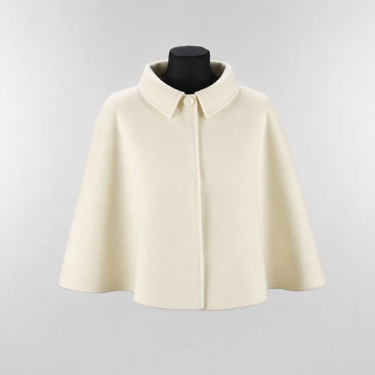 Éloïse - short double faced cashmere bolero cape, cut to frame the shoulders.