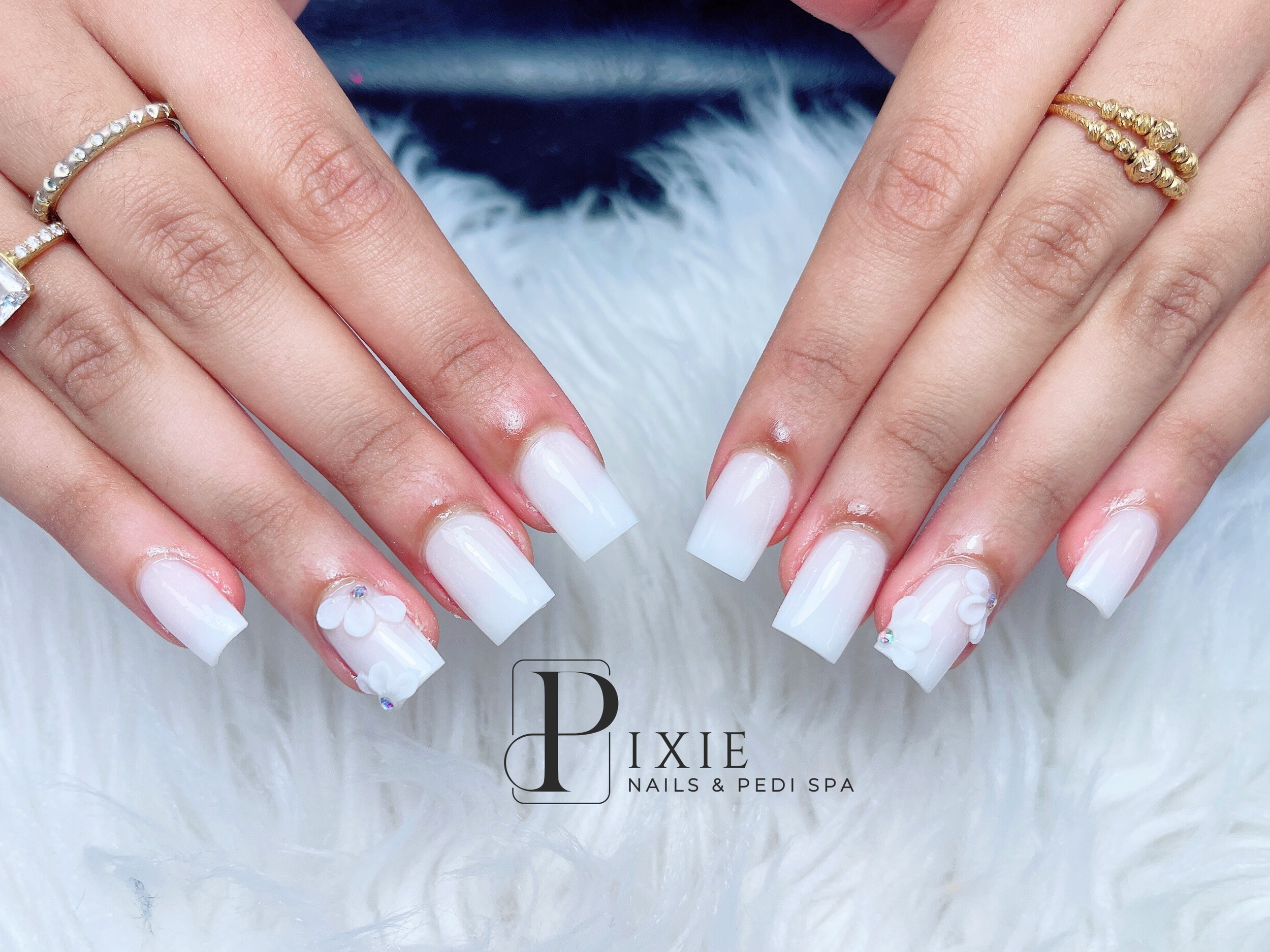 Milky white nails with 3D flowers - Pixie Nails Derby.png