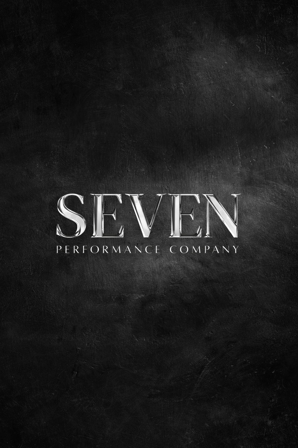 Black textured background with silver text reading 'SEVEN PERFORMANCE COMPANY'