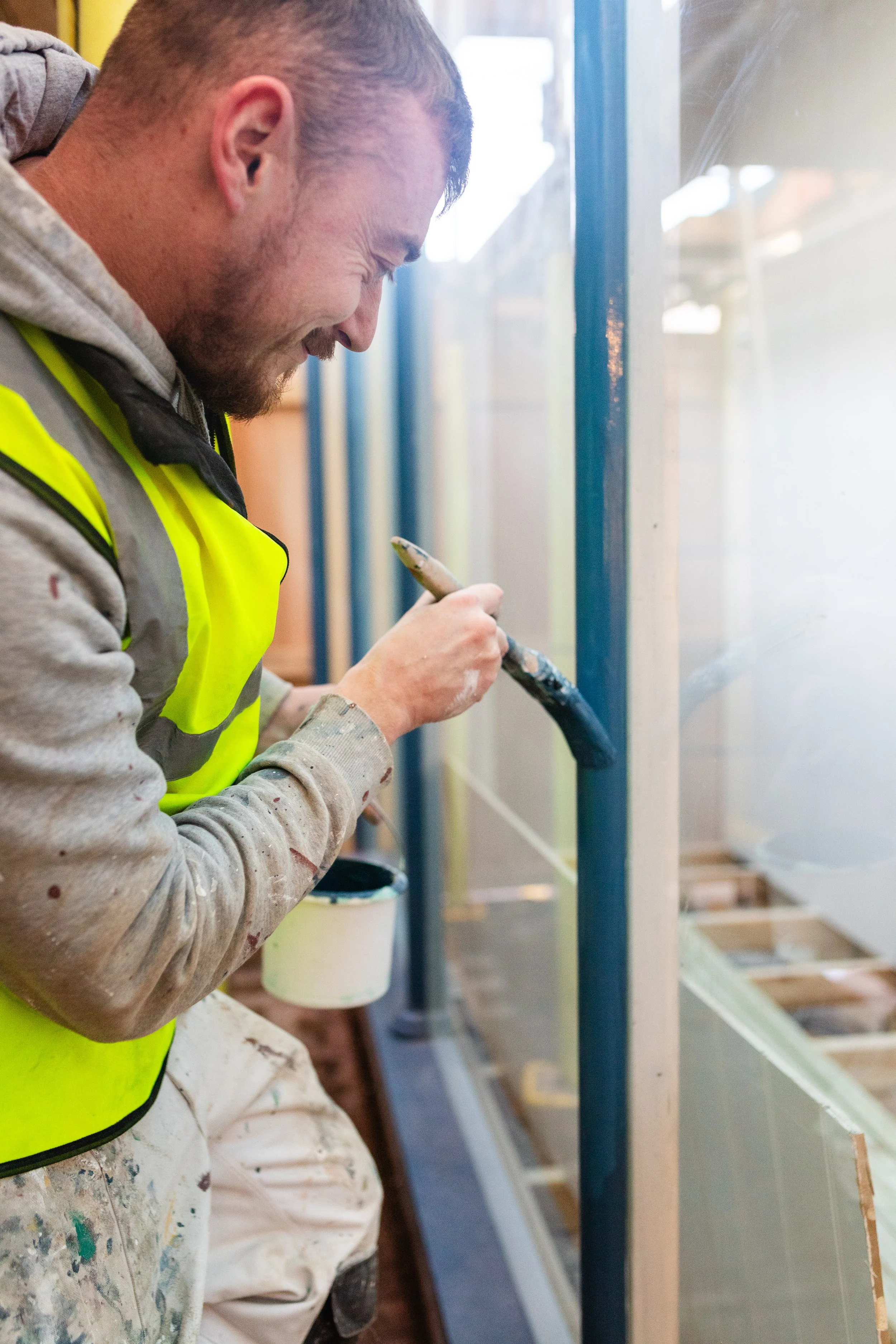 Ren Contractors On Site Team Painting Close Up