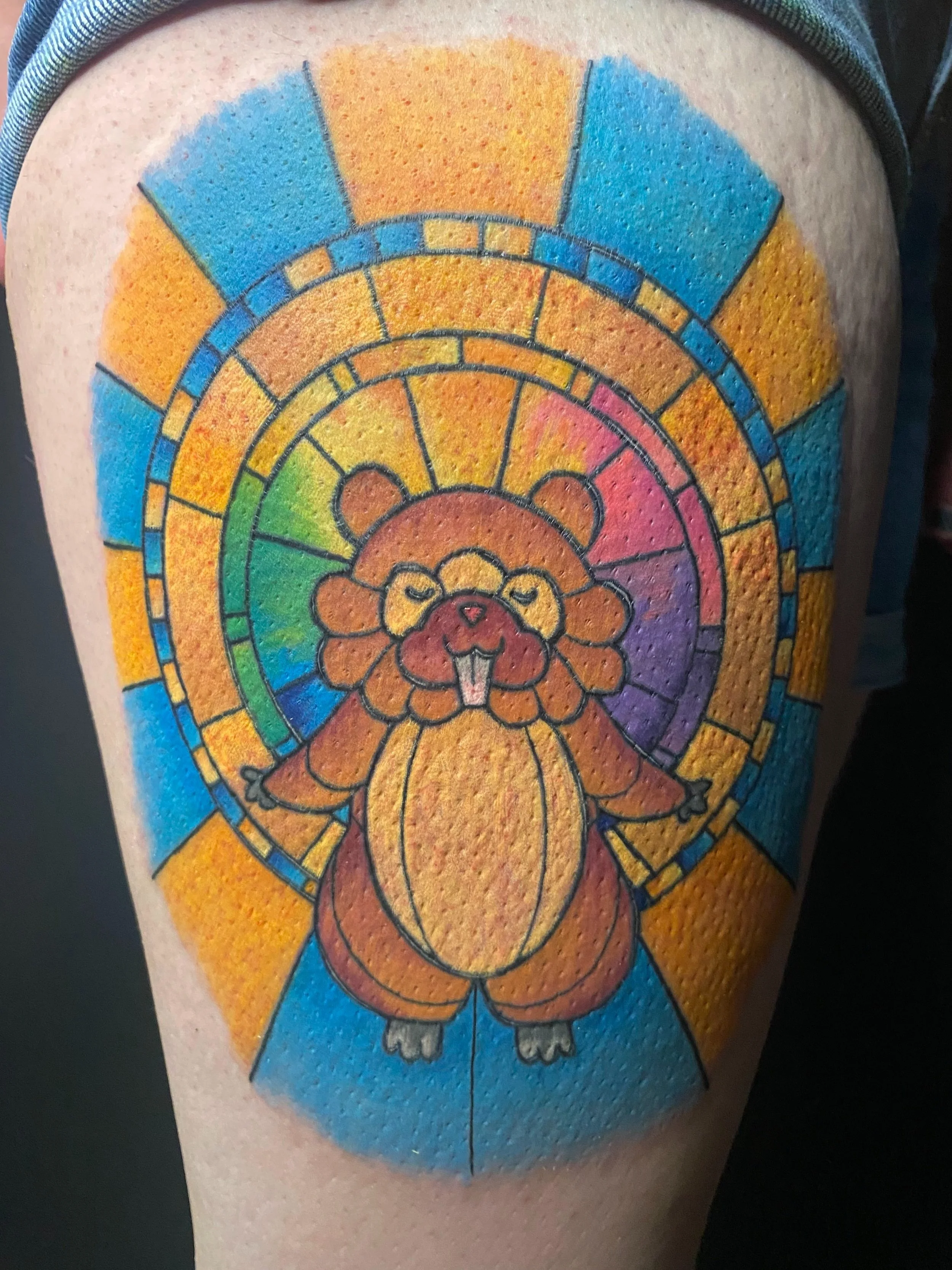 Our Lord and Savior Bidoof Pokemon tattoo in a stained glass style