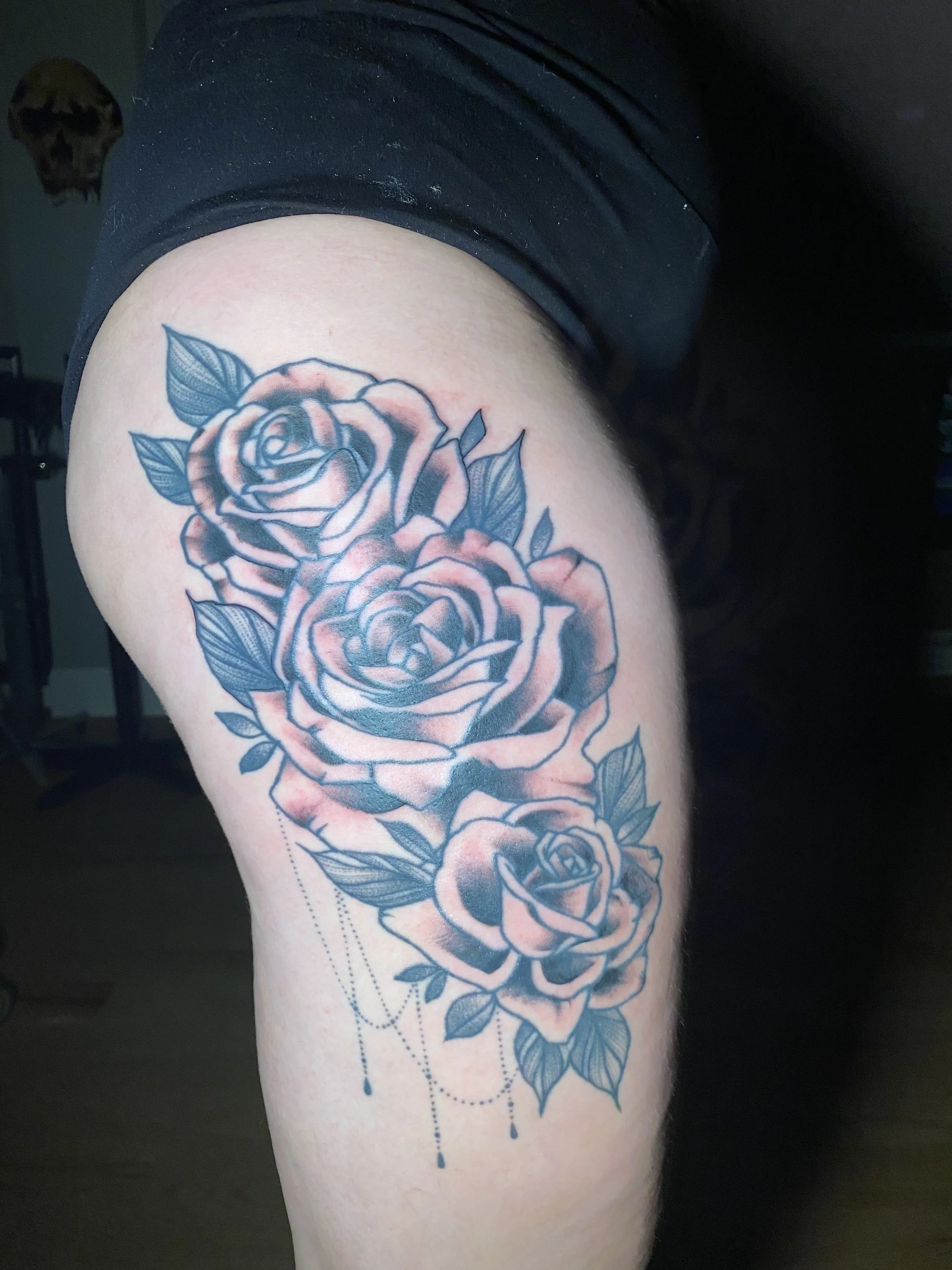 Fill in on existing black and grey rose tattoo