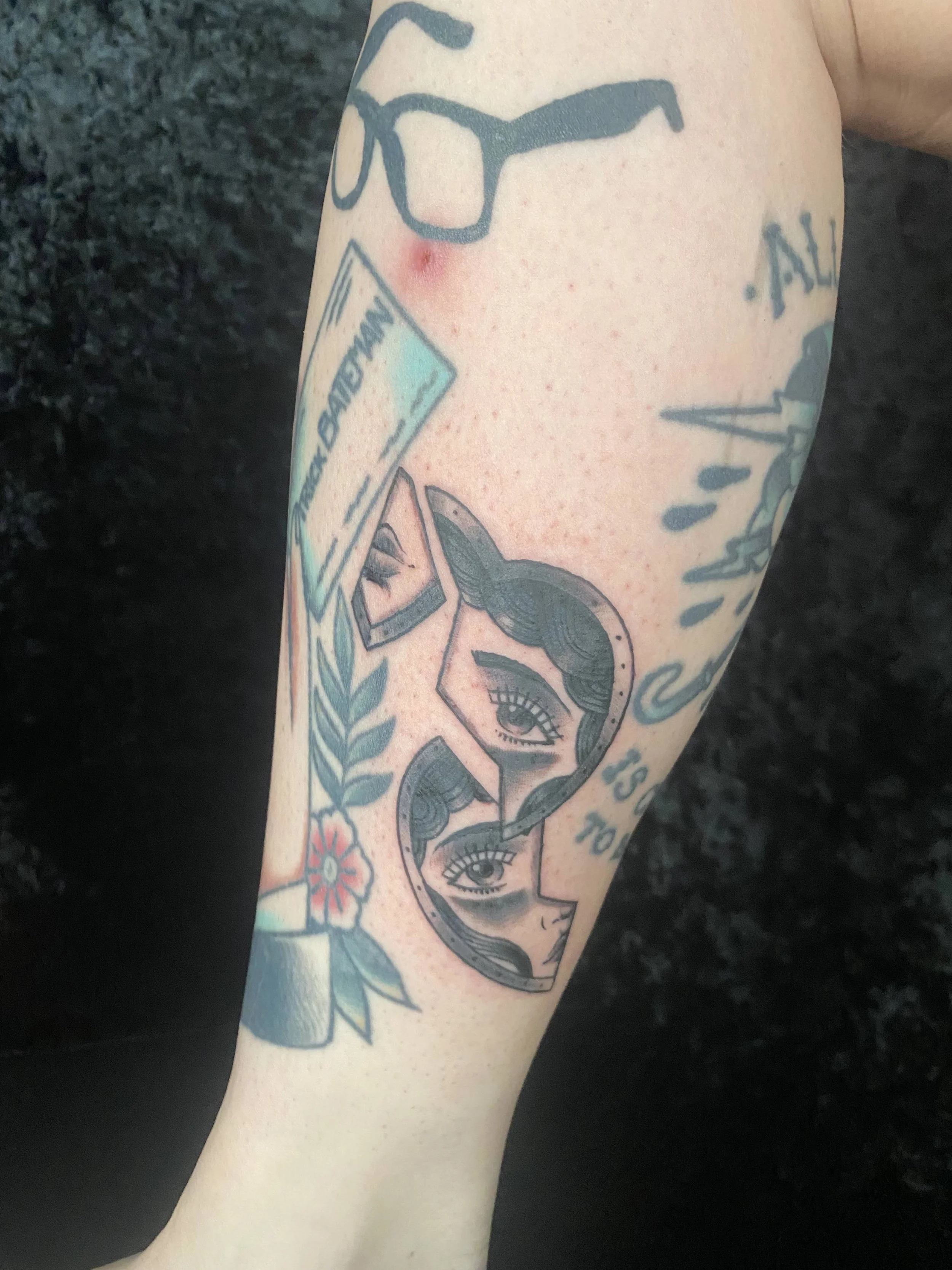 American Traditional black and grey broken lady face tattoo by Denver tattoo artist Joshua Socrates in RiNo.