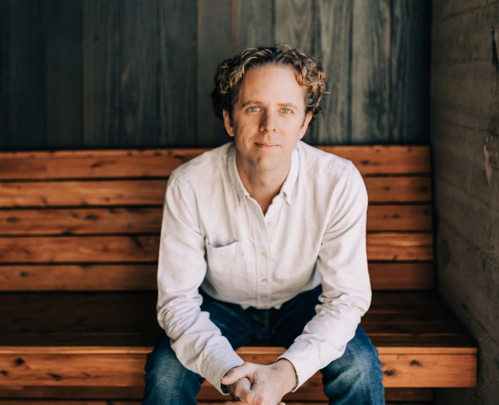 picture of james traub sitting on a bench