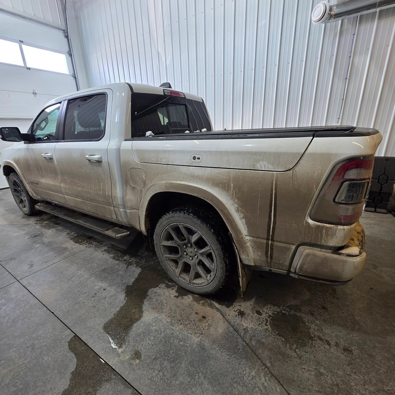 This is what Revision actually does after a long Alberta winter.

The left side shows what six months of salt, iron fallout, and contamination does to your paint. The right side is after one Revision package &mdash; full decontamination and ceramic s