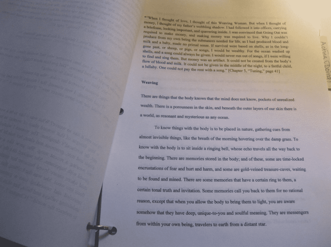 A manuscript page in an open looseleaf binder, by Naomi Rose.